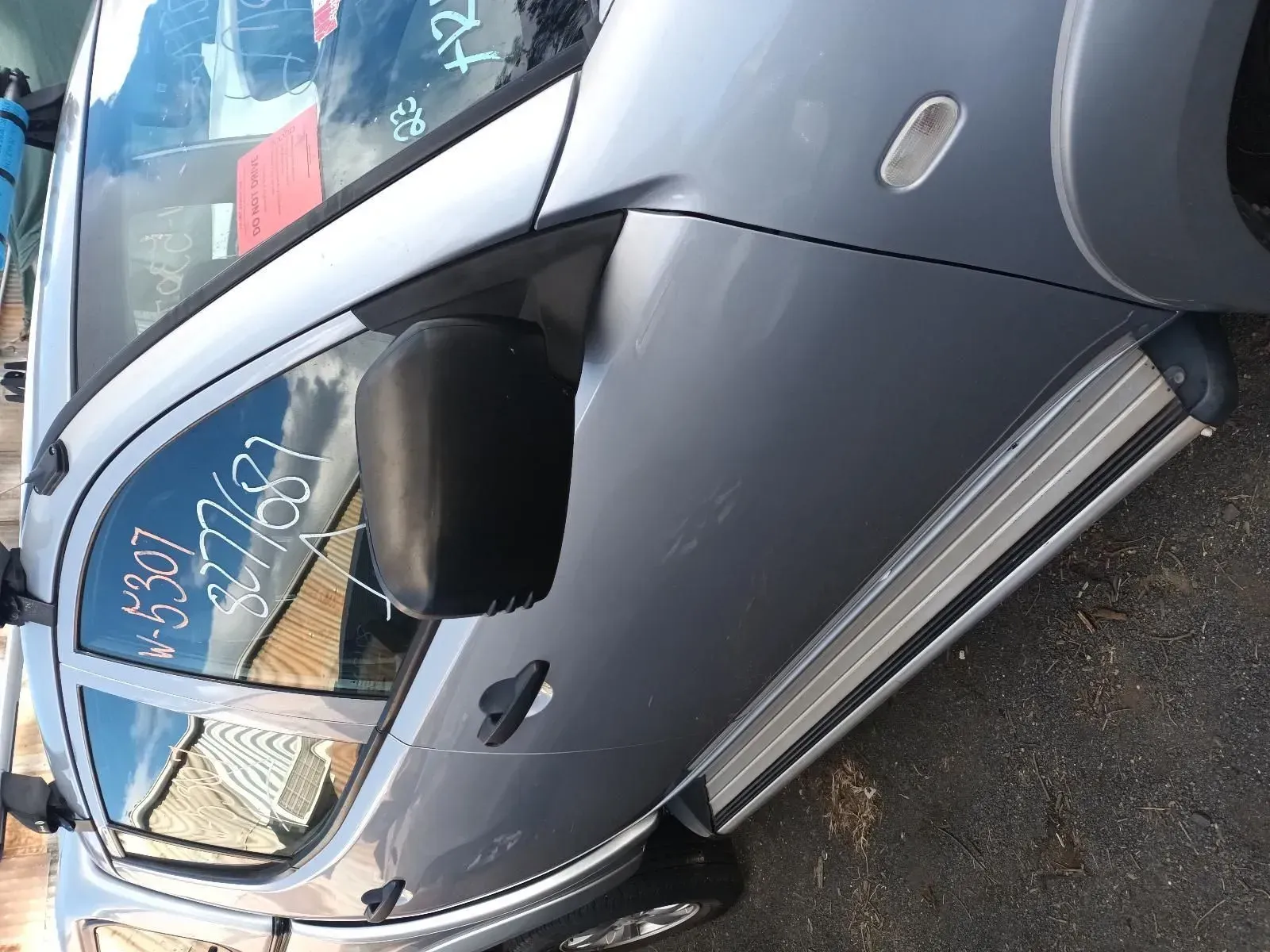 Gray Car Door With Black Side Mirror — South West 4WD Wreckers In Brisbane, QLD