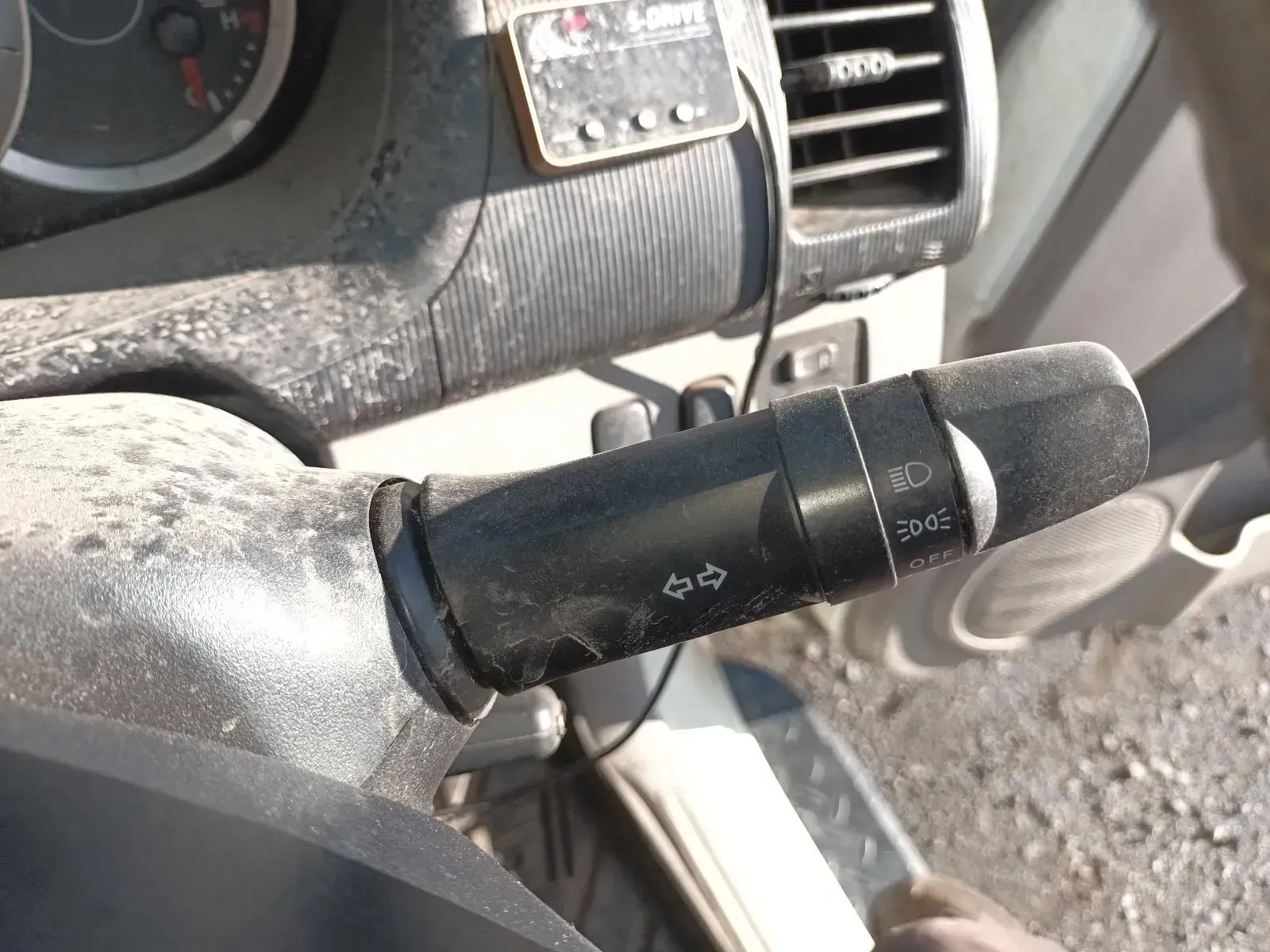 Steering Column Lever With Turn Signal and Headlight Controls in a Dusty Vehicle — South West 4WD Wreckers In Brisbane, QLD