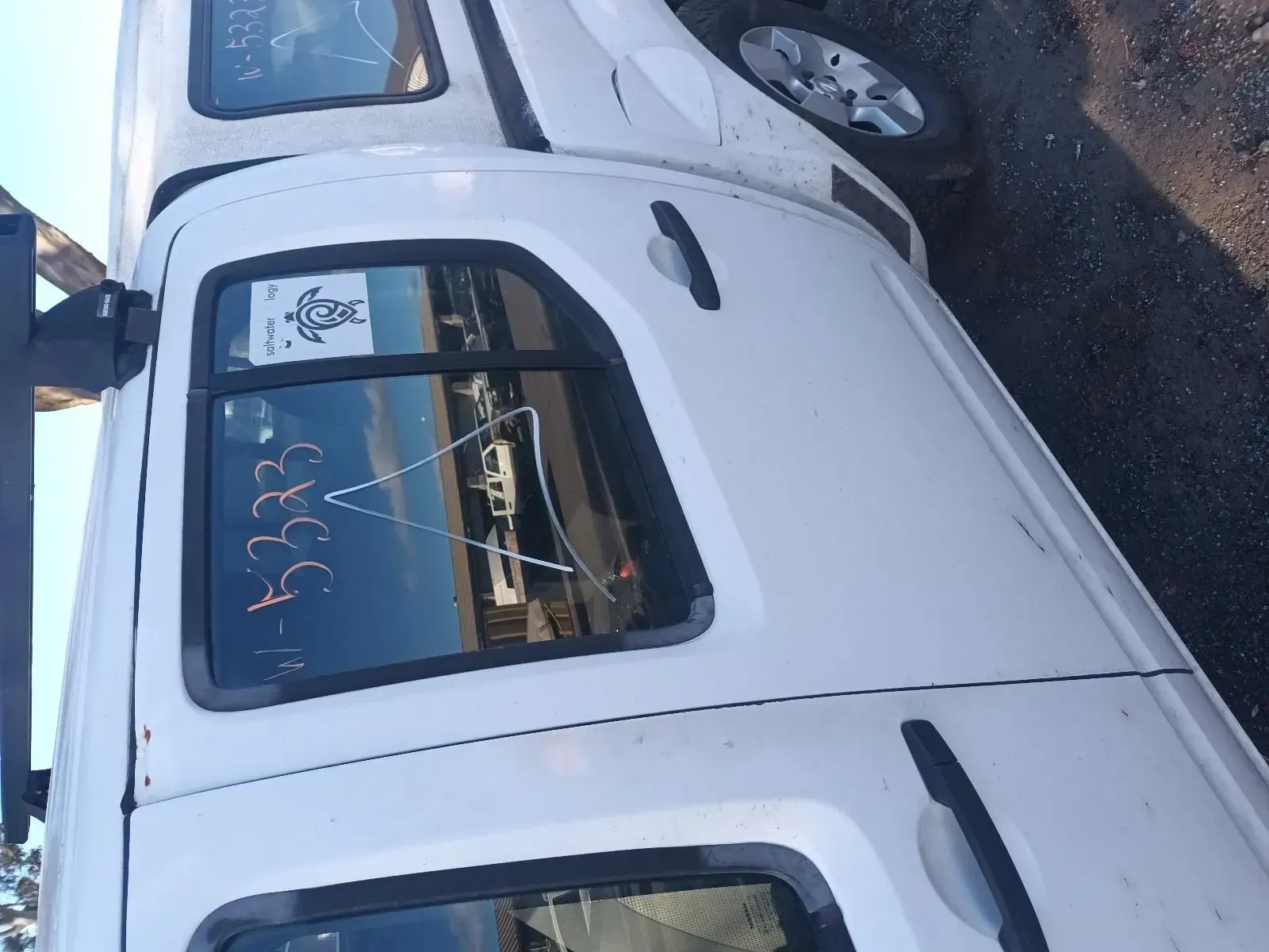 White Pickup Truck With a Camper Shell — South West 4WD Wreckers In Brisbane, QLD