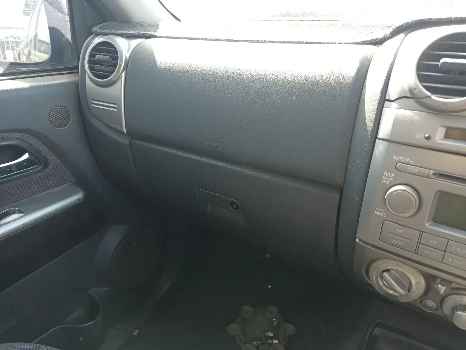 Gray Car Dashboard Interior With Air Vents, Glove Box, and Controls — South West 4WD Wreckers In Brisbane, QLD