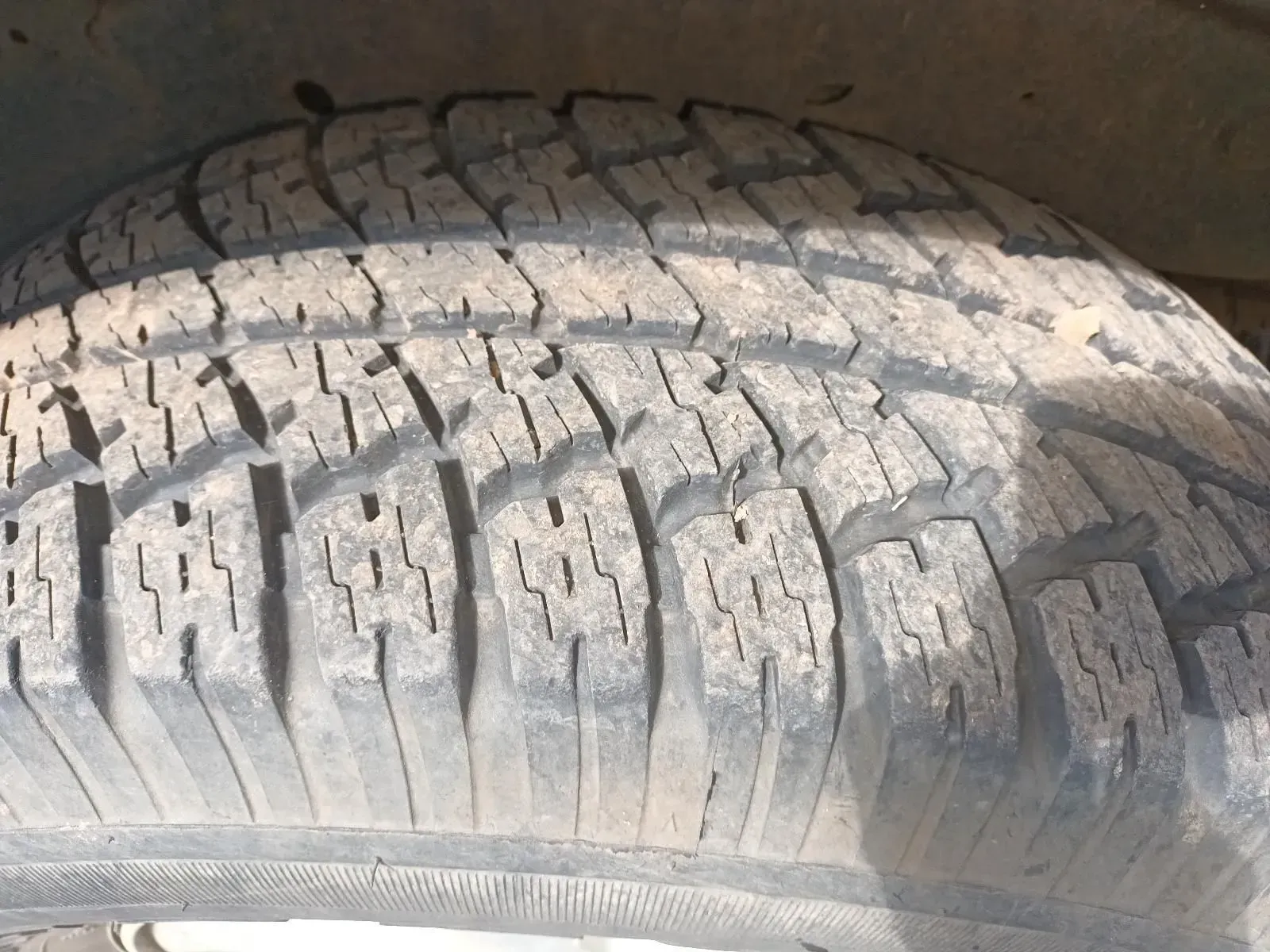 Close-up of a Worn Tyre With Visible Tread Pattern, Showing Signs of Wear and Tear — South West 4WD Wreckers In Brisbane, QLD