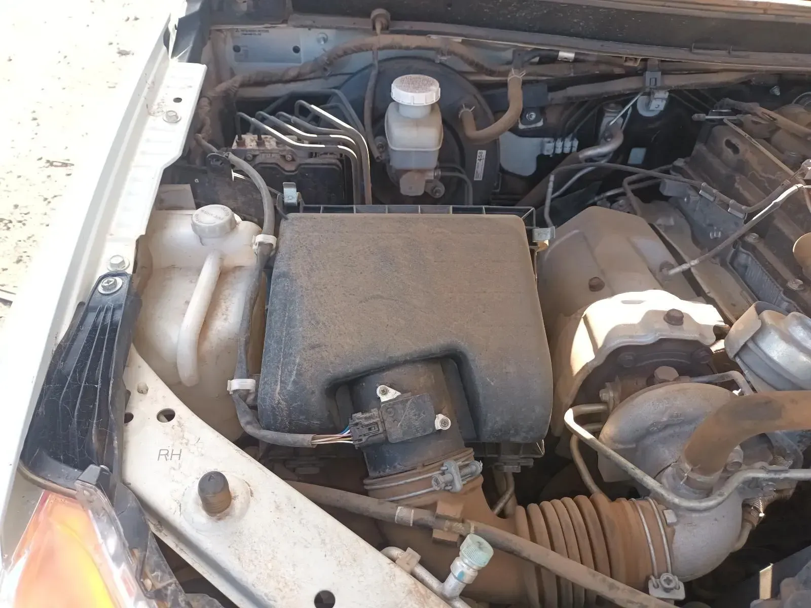 Engine Compartment With Air Filter Box, Brake Fluid Reservoir, and Various Hoses — South West 4WD Wreckers In Brisbane, QLD