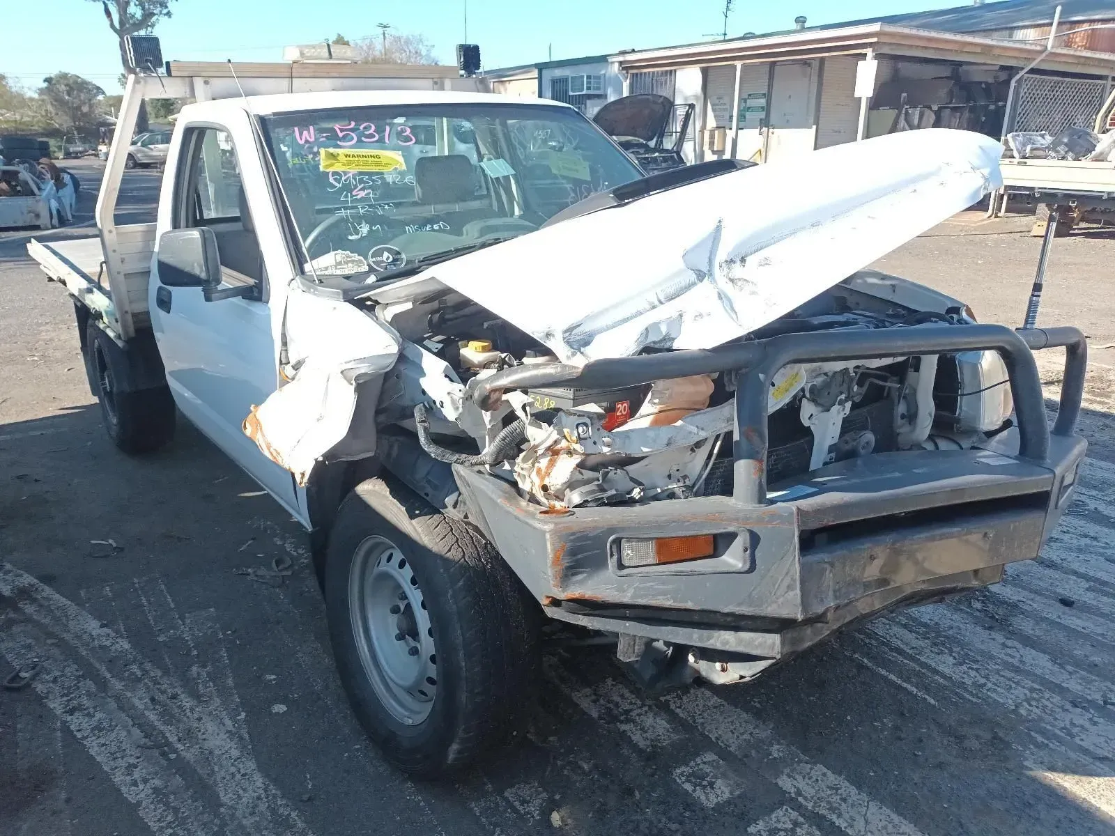 White Pickup Truck Severely Damaged in a Collision — South West 4WD Wreckers In Brisbane, QLD