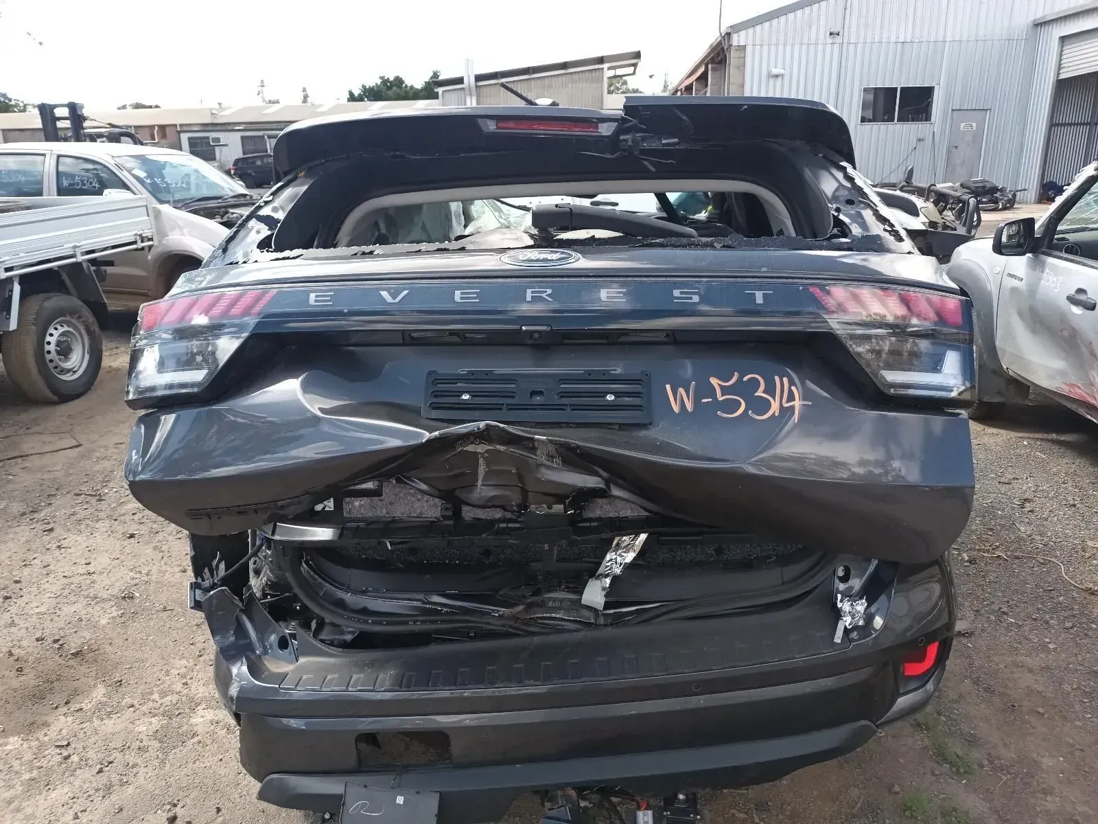 Damaged Black Ford Everest SUV Rear End at a Salvage Yard — South West 4WD Wreckers In Brisbane, QLD