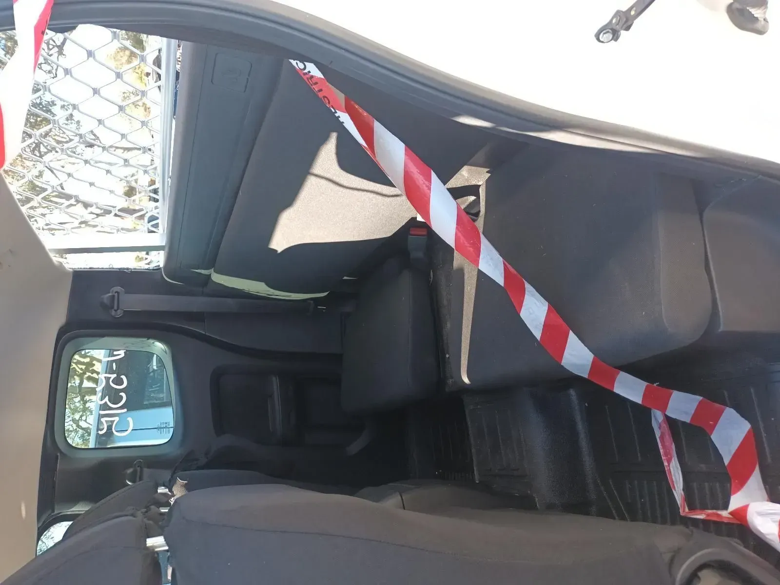 Red and White Striped Caution Tape Draped Inside a Vehicle — South West 4WD Wreckers In Brisbane, QLD