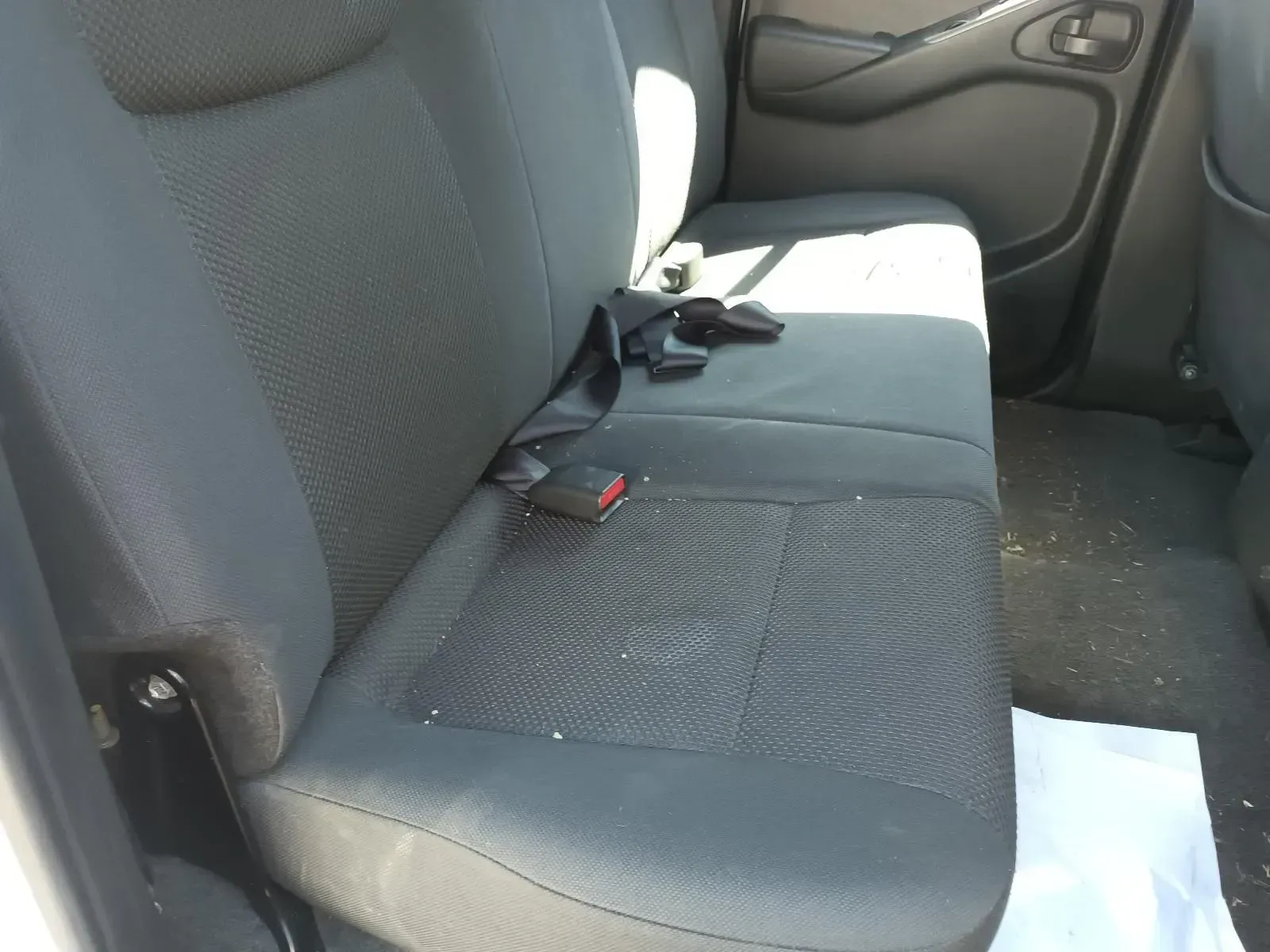 Gray Car Backseat With Seatbelts, Light Shining Through the Window — South West 4WD Wreckers In Brisbane, QLD