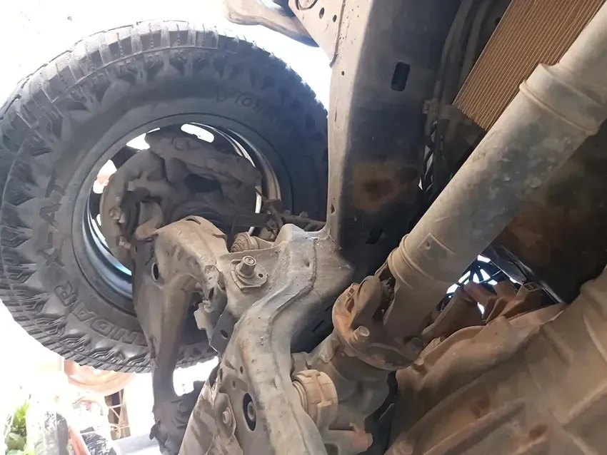 A Close Up of the Underside of a Vehicle With a Tire on It — South West 4WD Wreckers In Brisbane, QLD