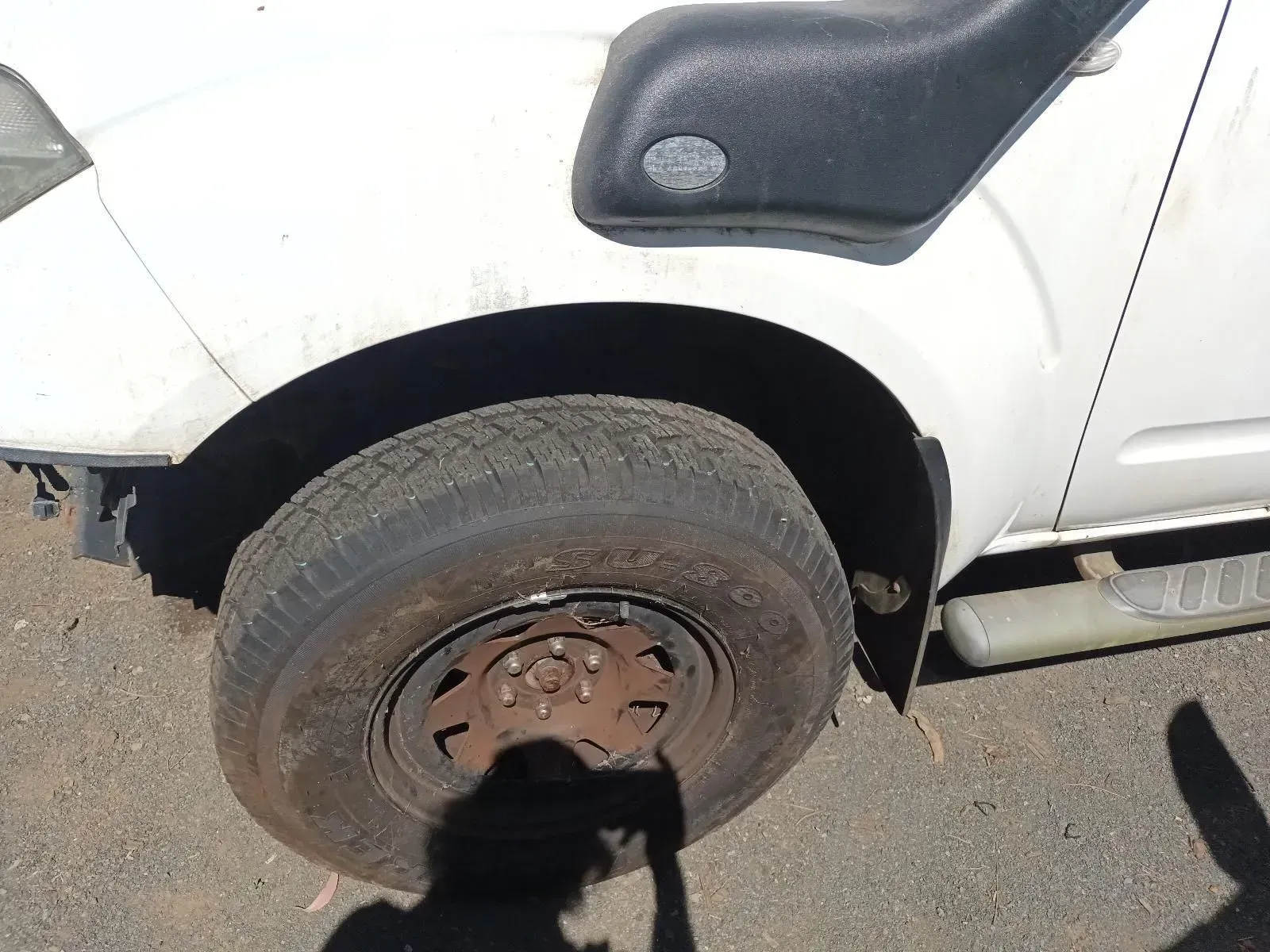 White Truck Tyre With a Rusty Wheel. a Black Snorkel is Attached — South West 4WD Wreckers In Brisbane, QLD