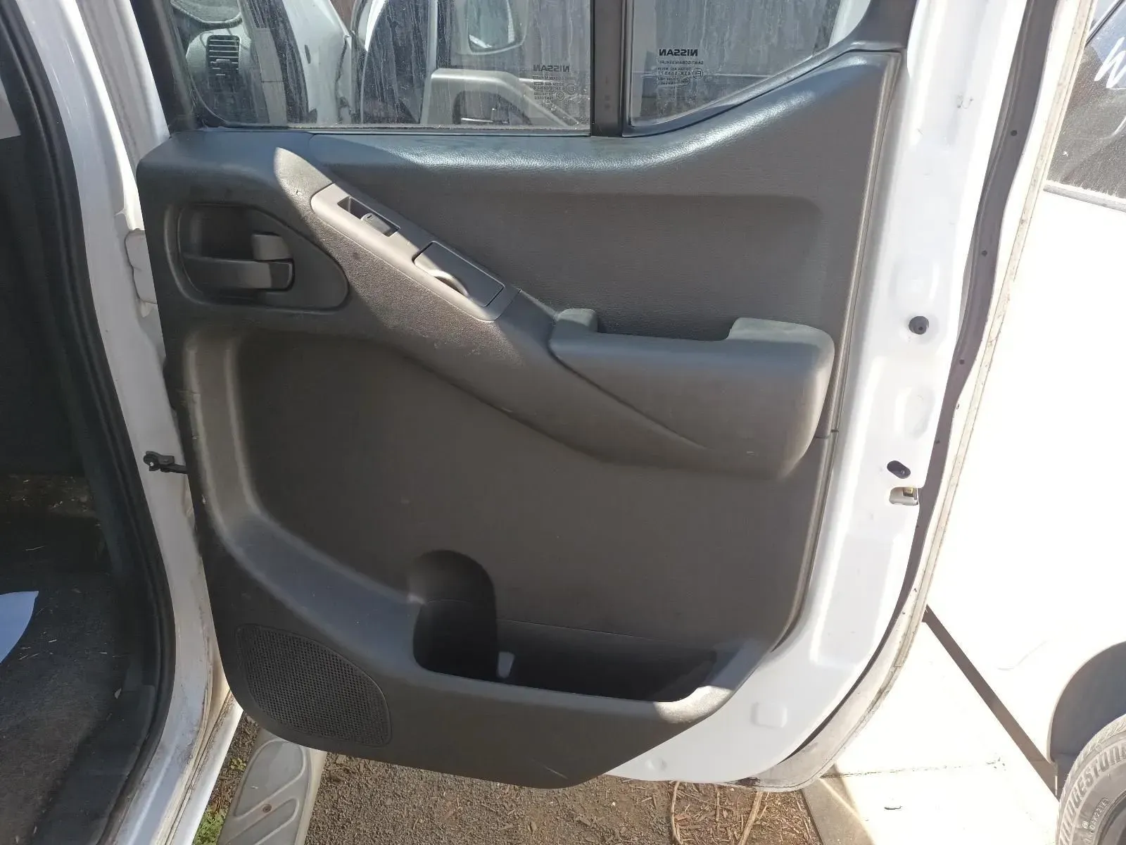 Gray Interior Car Door Panel With Window Controls and Handle — South West 4WD Wreckers In Brisbane, QLD
