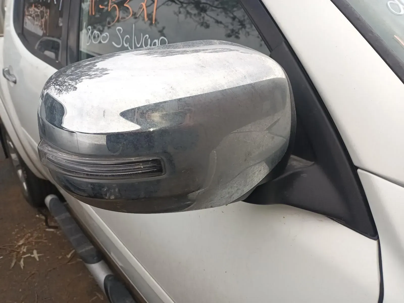 Chrome Side Mirror on White Car, Featuring a Turn Signal — South West 4WD Wreckers In Brisbane, QLD
