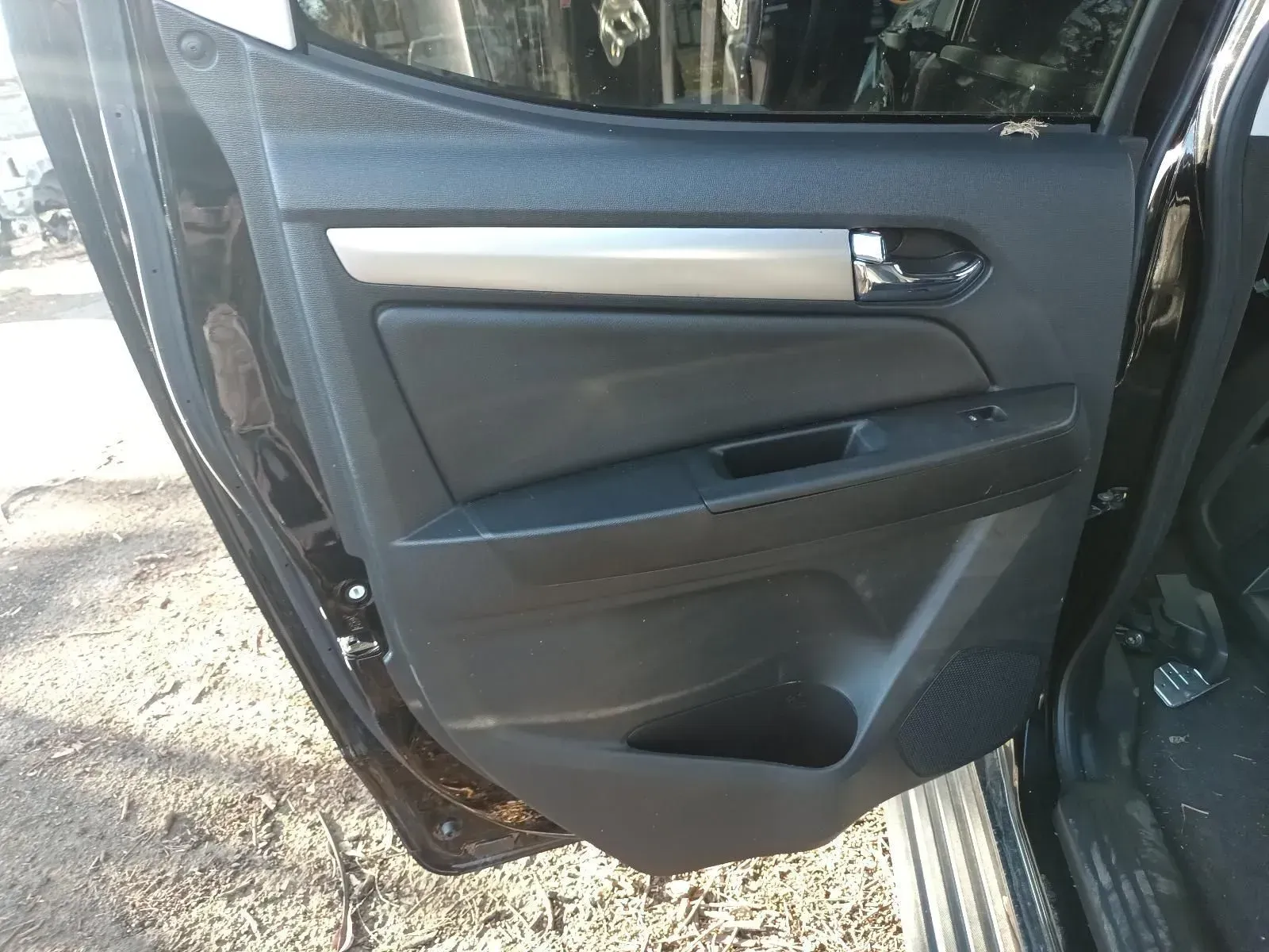 Black Car Door Interior With Handle, Window, and Control Panel — South West 4WD Wreckers In Brisbane, QLD