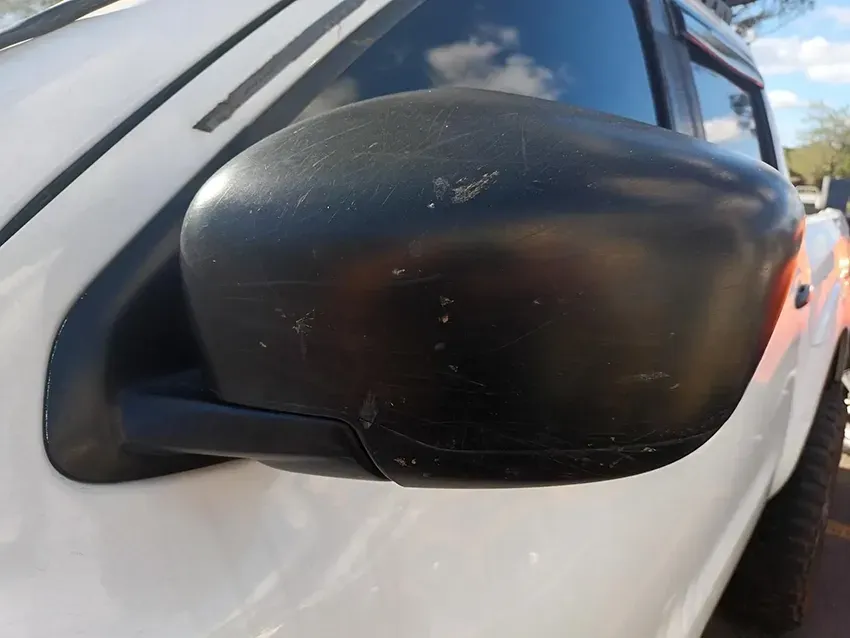 A Close Up of a Side View Mirror on a White Car — South West 4WD Wreckers In Brisbane, QLD