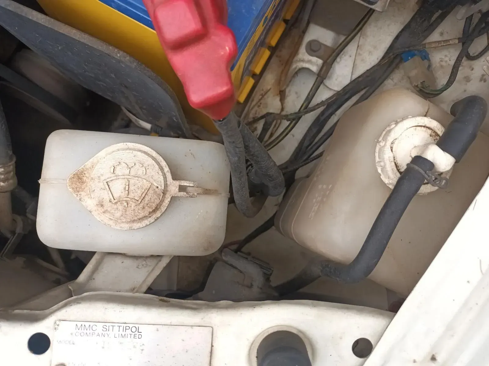 Engine Bay With Two White Fluid Reservoirs — South West 4WD Wreckers In Brisbane, QLD
