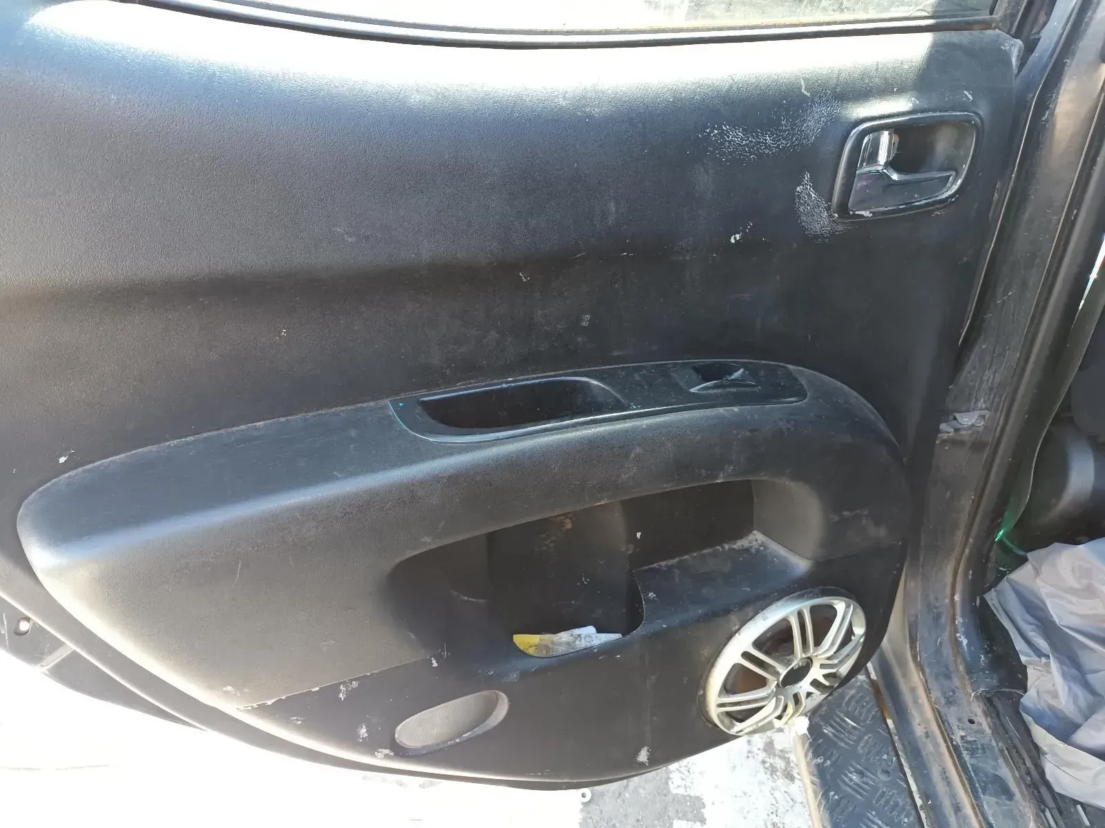 Black Car Door Panel With Power Window Controls, Speaker, and Wear — South West 4WD Wreckers In Brisbane, QLD