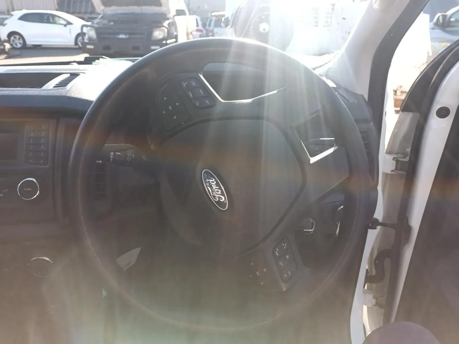 Black Ford Steering Wheel, Controls Visible, Interior Vehicle Shot — South West 4WD Wreckers In Brisbane, QLD