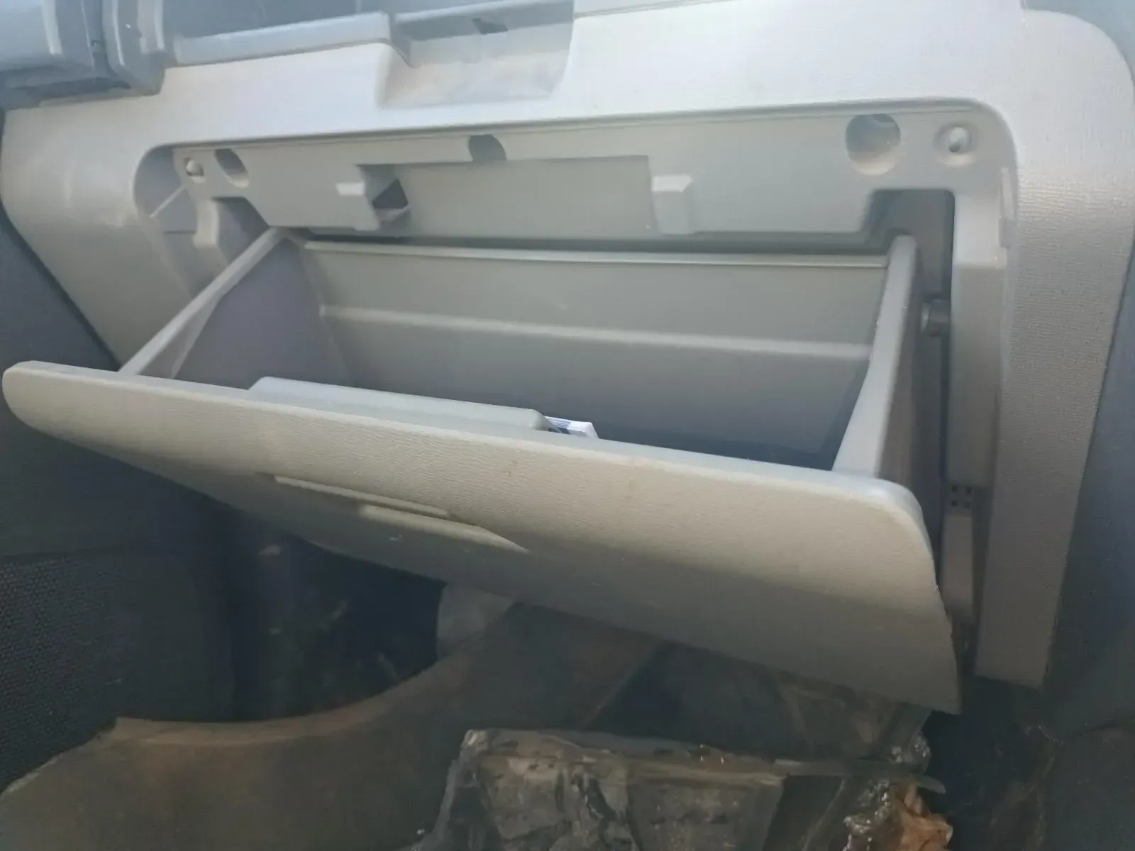 Open Car Glove Compartment, Light Gray, With the Door Ajar — South West 4WD Wreckers In Brisbane, QLD