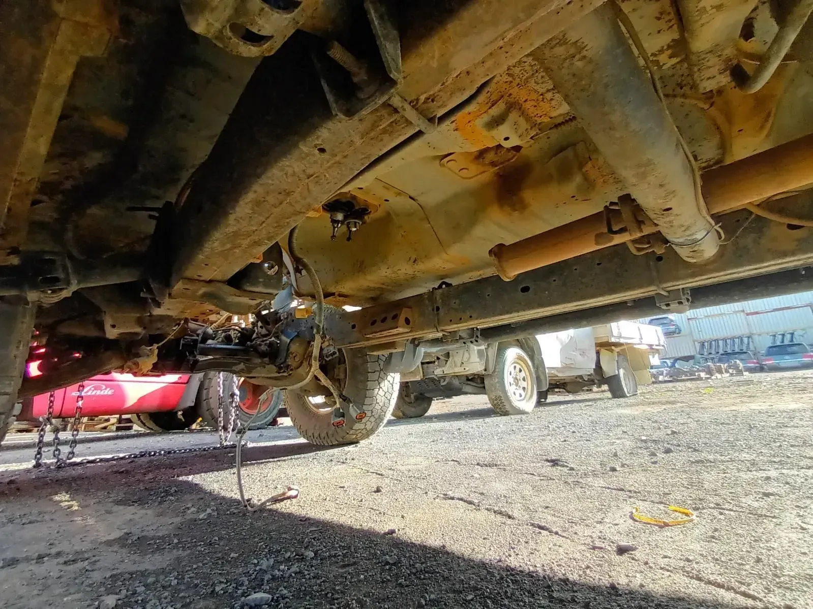 Undercarriage of a Rusty Vehicle With Visible Frame — South West 4WD Wreckers In Brisbane, QLD