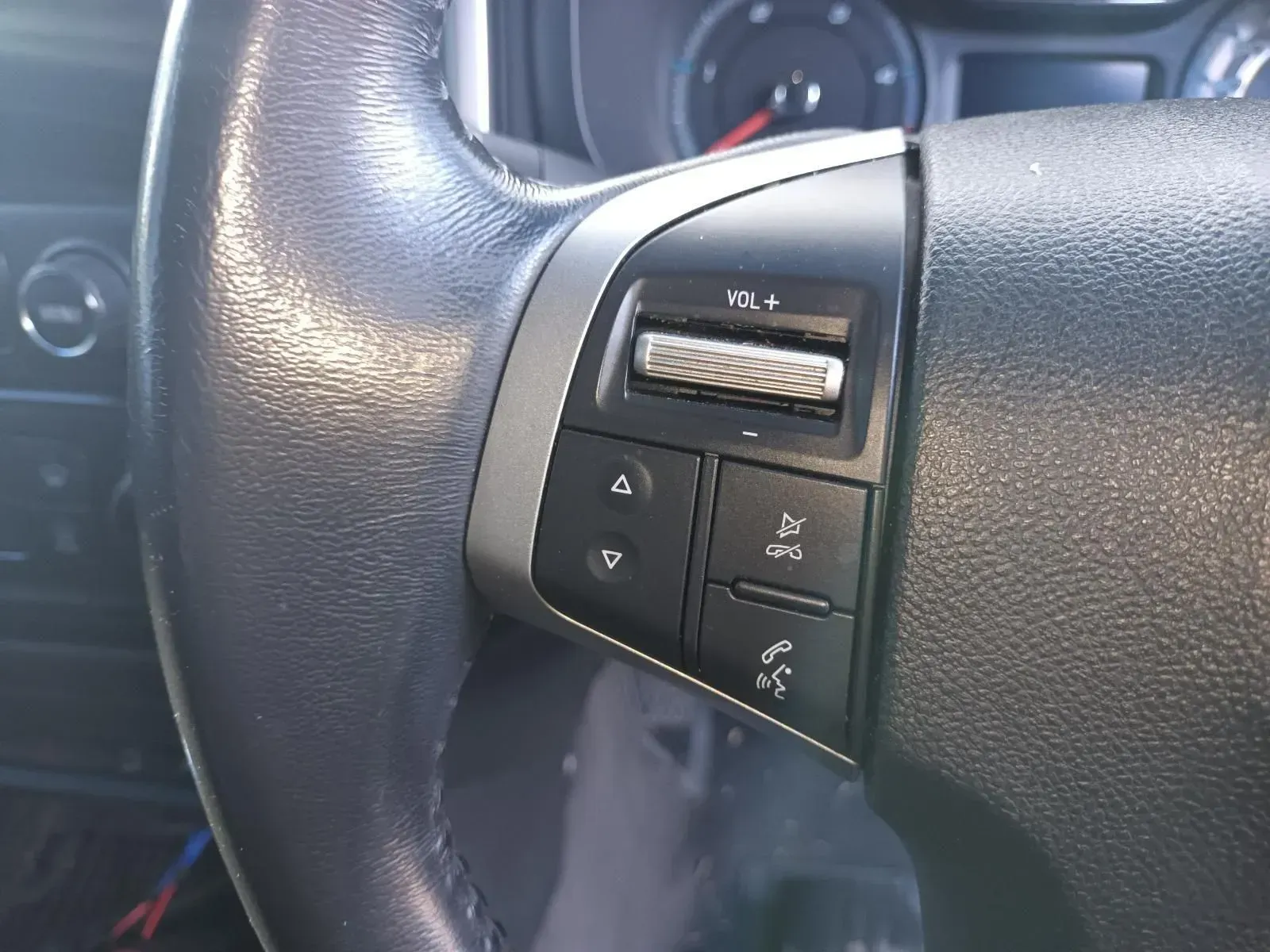 Close-up of a Car's Steering Wheel With Buttons for Volume — South West 4WD Wreckers In Brisbane, QLD