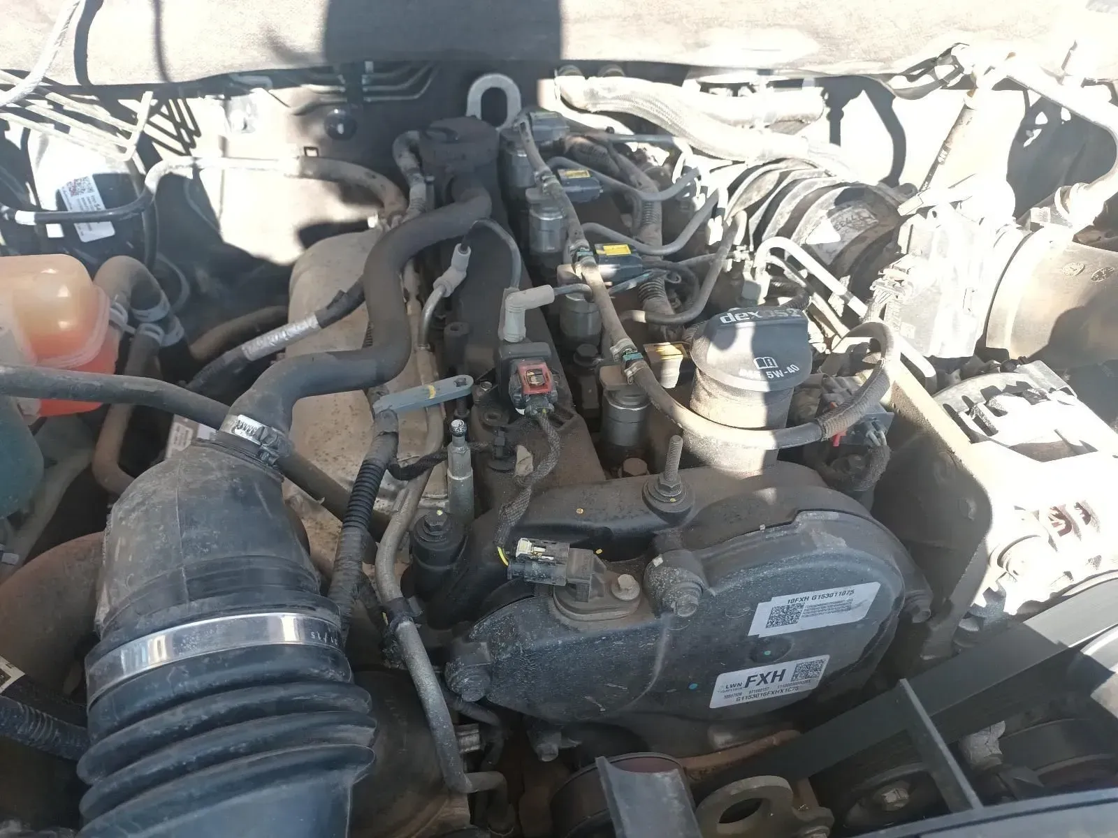 An Engine Bay of a Vehicle Showing Various Parts and Components — South West 4WD Wreckers In Brisbane, QLD