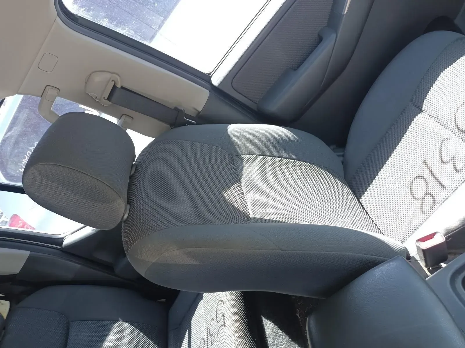 Grey Cloth Car Seat With Headrest, Inside a Car — South West 4WD Wreckers In Brisbane, QLD