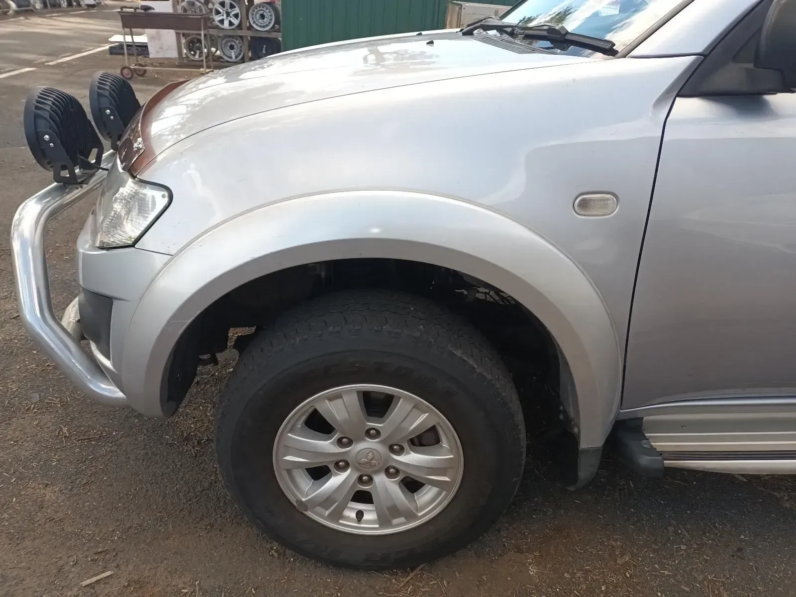 Silver Car's Front, Bull Bar, Extra Lights, and Wheel — South West 4WD Wreckers In Brisbane, QLD