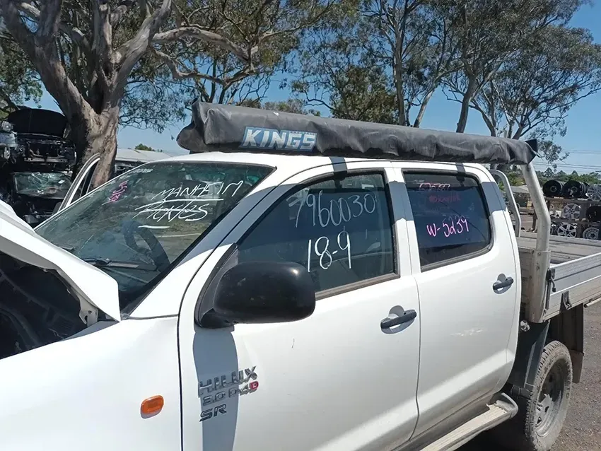 A White Truck With a Kings Tent on Top of It — South West 4WD Wreckers In Brisbane, QLD