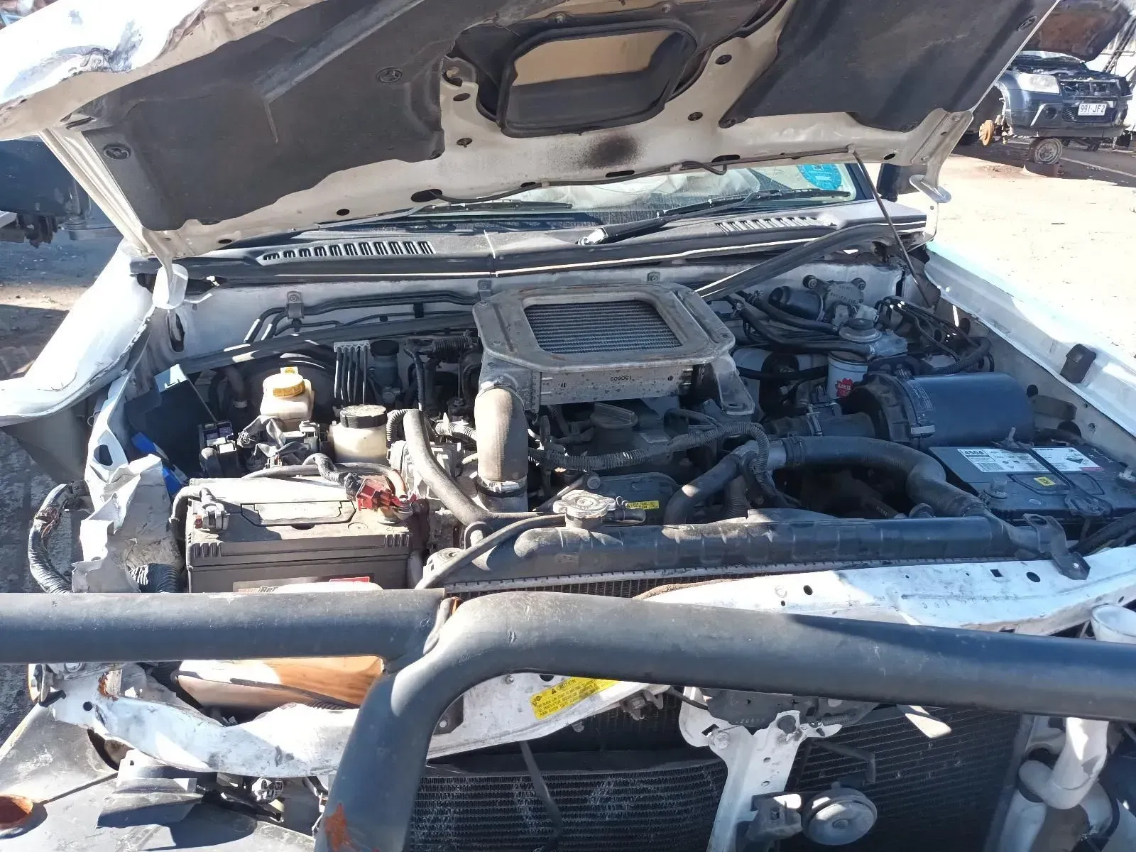 White Pickup Truck With Extensive Front-end Damage — South West 4WD Wreckers In Brisbane, QLD