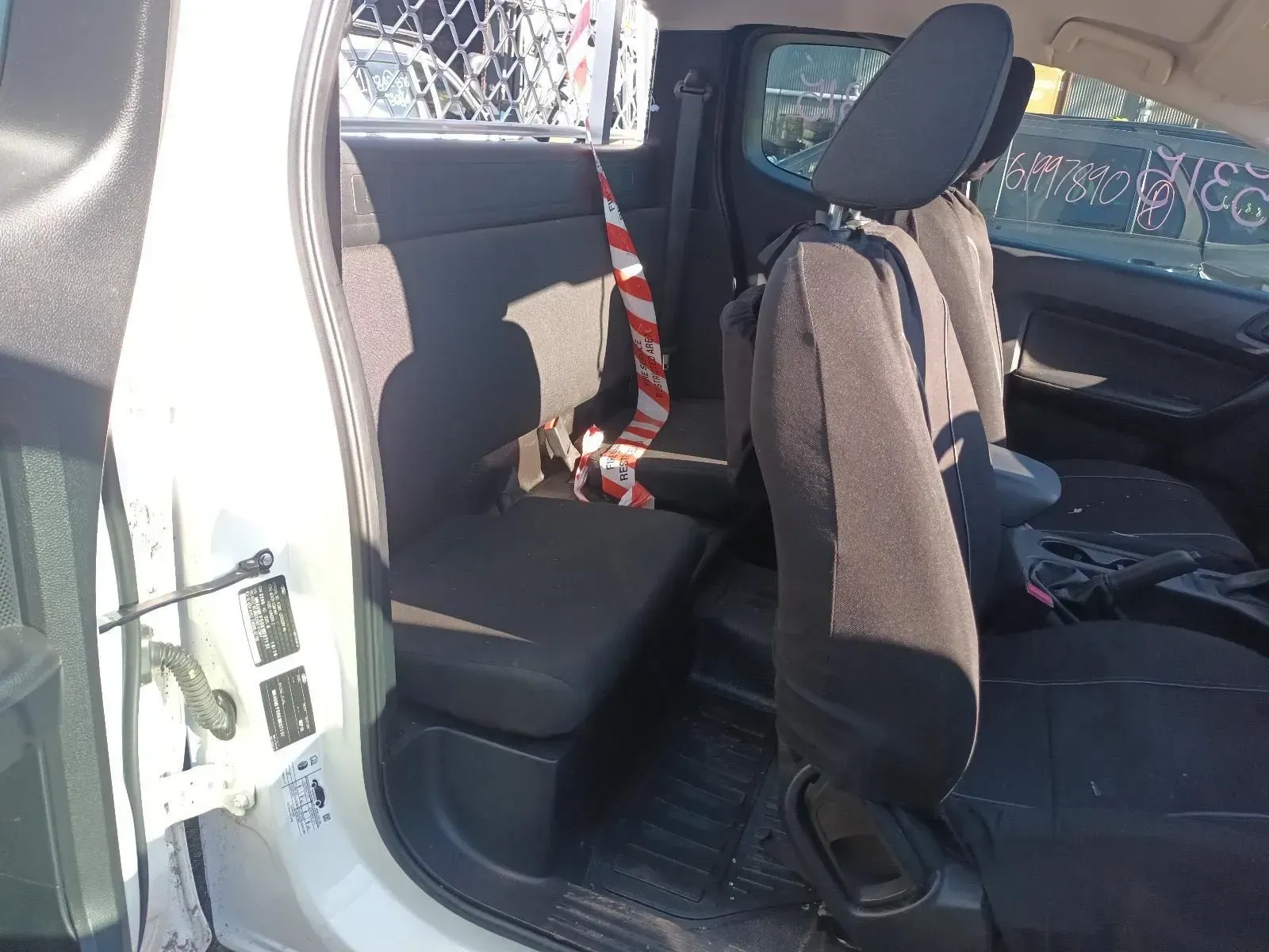 Interior of White Truck With Black Seats, a Red and White Strap — South West 4WD Wreckers In Brisbane, QLD