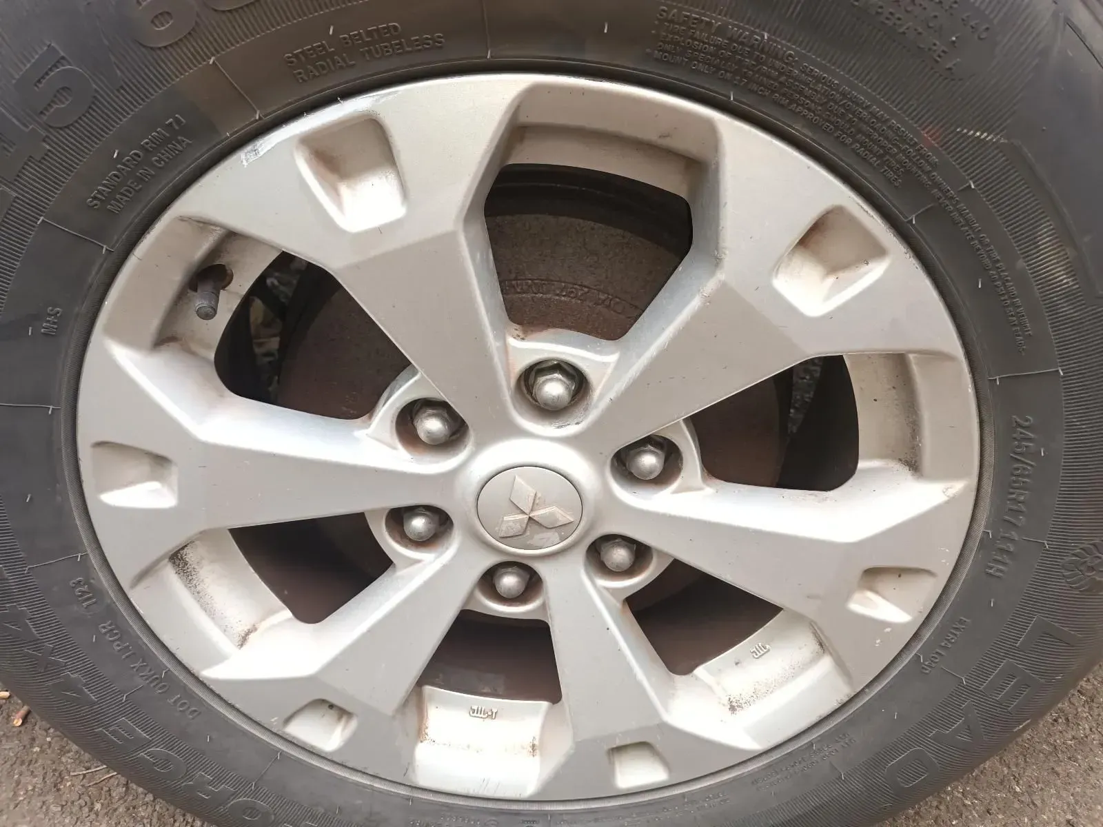 Silver Mitsubishi Car Wheel and Tyre — South West 4WD Wreckers In Brisbane, QLD