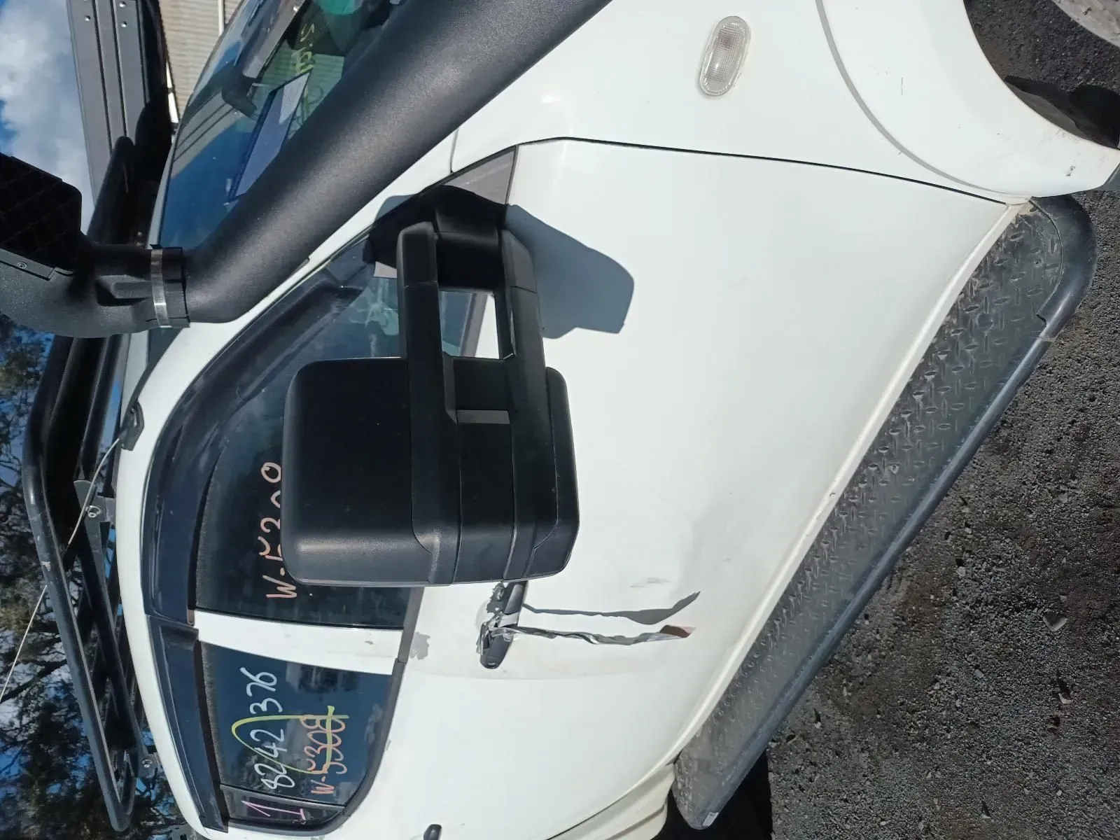 White Truck With a Black Side Mirror and a Snorkel — South West 4WD Wreckers In Brisbane, QLD