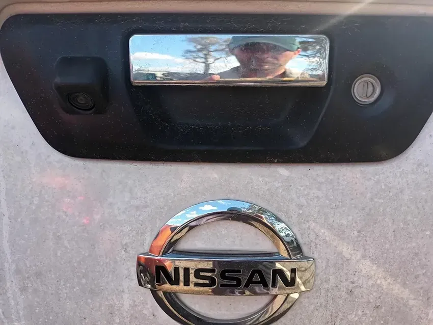 A Nissan Logo is on the Back of a Car — South West 4WD Wreckers In Brisbane, QLD
