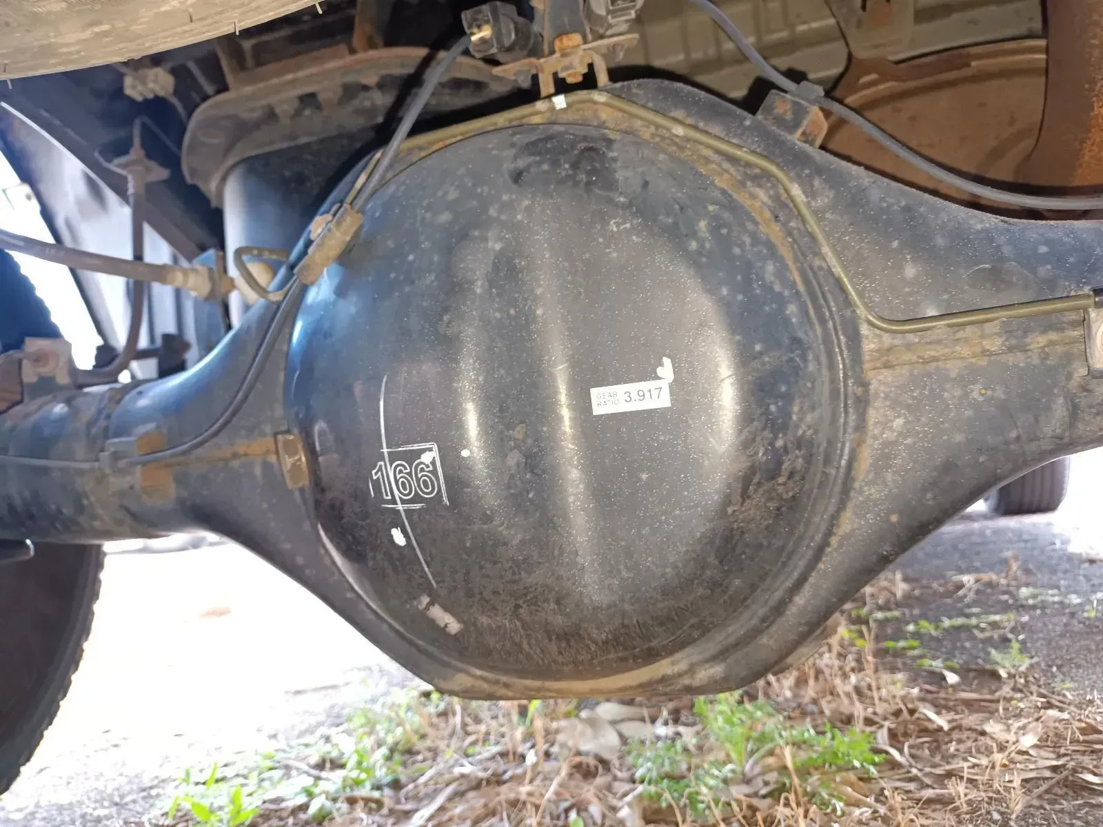 Black Rear Axle of a Vehicle, Seen From Below — South West 4WD Wreckers In Brisbane, QLD