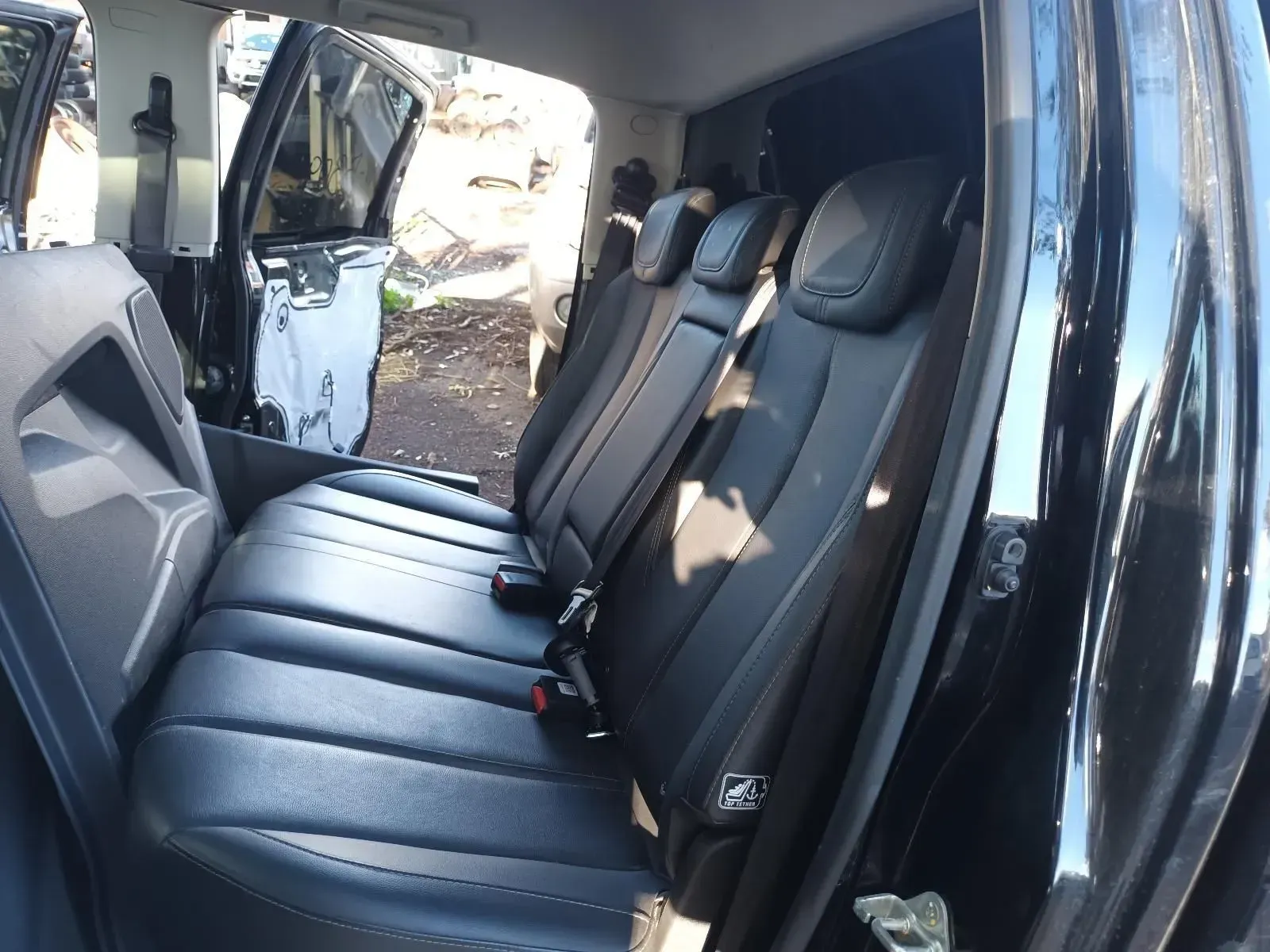Black Car Interior With Rear Seats, a Door Open to the Outside — South West 4WD Wreckers In Brisbane, QLD