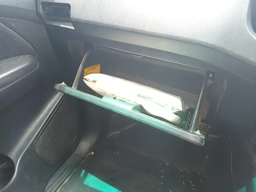 A Model Airplane is in the Glove Box of a Car — South West 4WD Wreckers In Brisbane, QLD