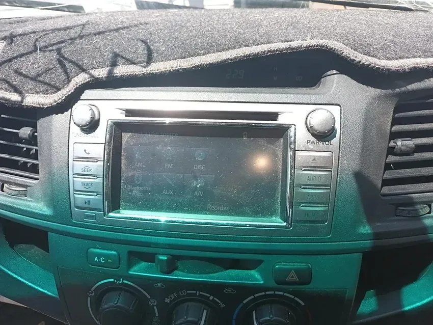 A Car Radio is Sitting on the Dashboard of a Car — South West 4WD Wreckers In Brisbane, QLD