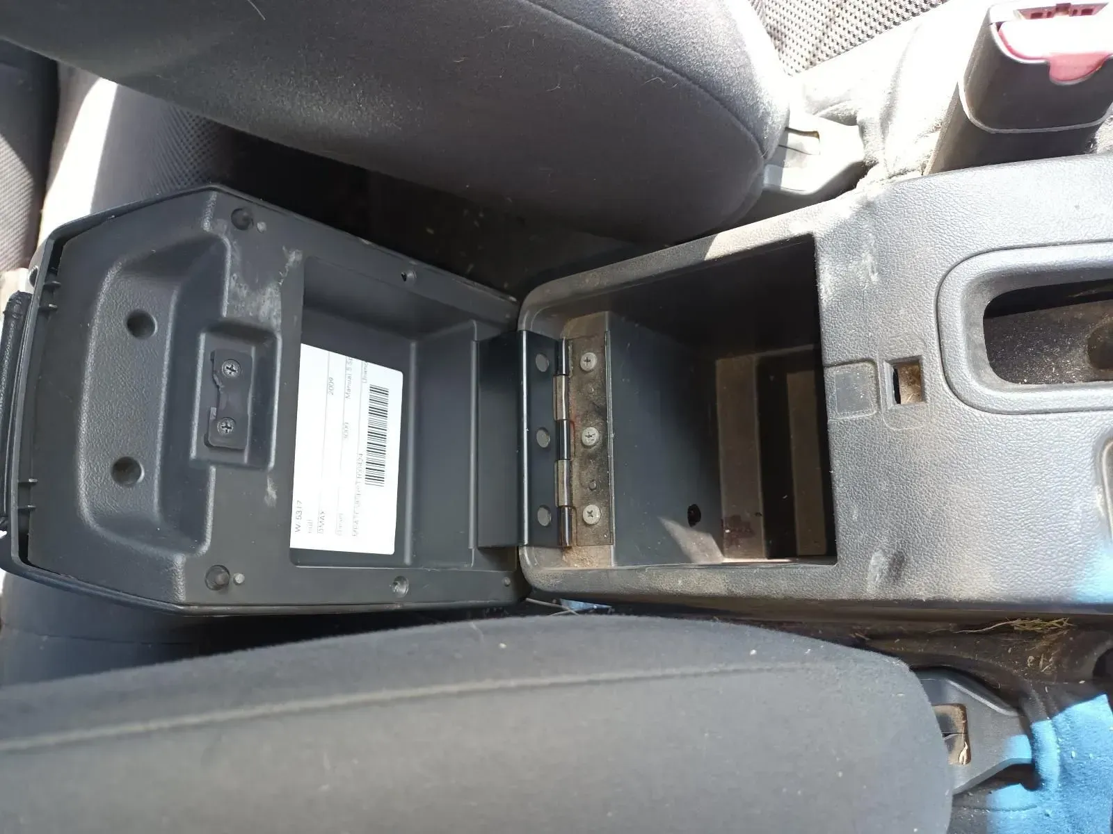 Open Black Car Console, Empty Storage Compartment, Attached to Car Seats — South West 4WD Wreckers In Brisbane, QLD