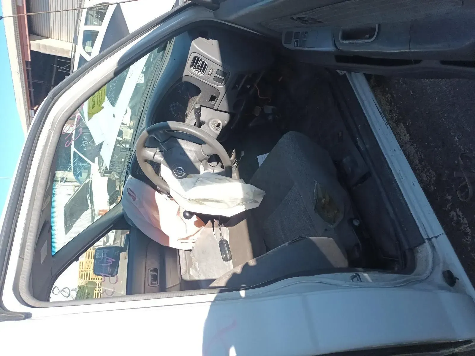 White Car Interior With Deployed Airbag, Indicating a Collision — South West 4WD Wreckers In Brisbane, QLD