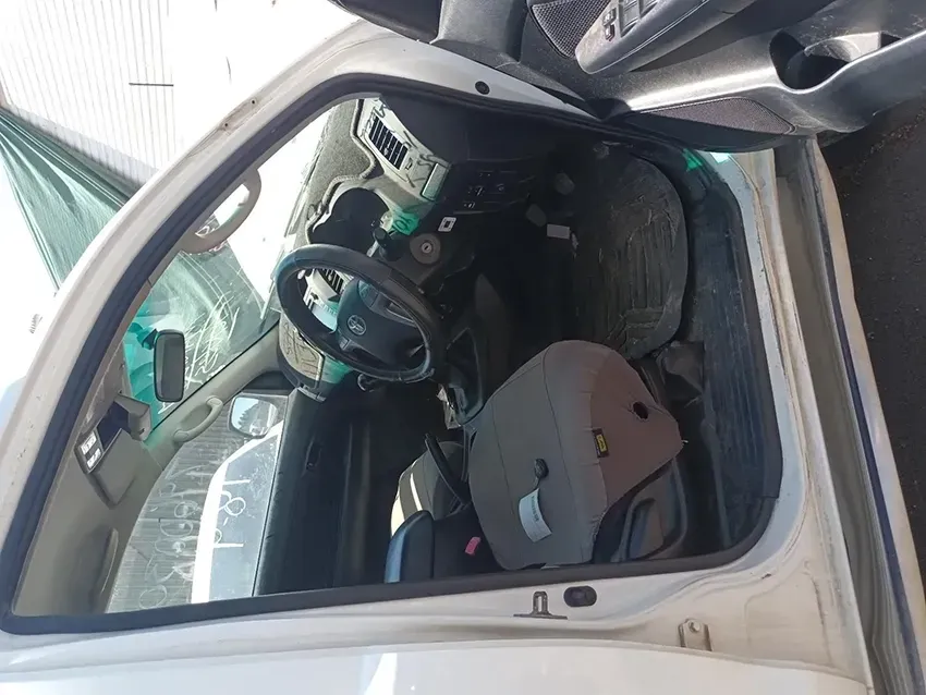 The Inside of a White Car With the Door Open — South West 4WD Wreckers In Brisbane, QLD