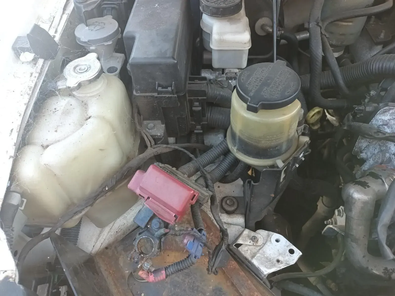 Engine Compartment of a Vehicle Showing Various Components — South West 4WD Wreckers In Brisbane, QLD