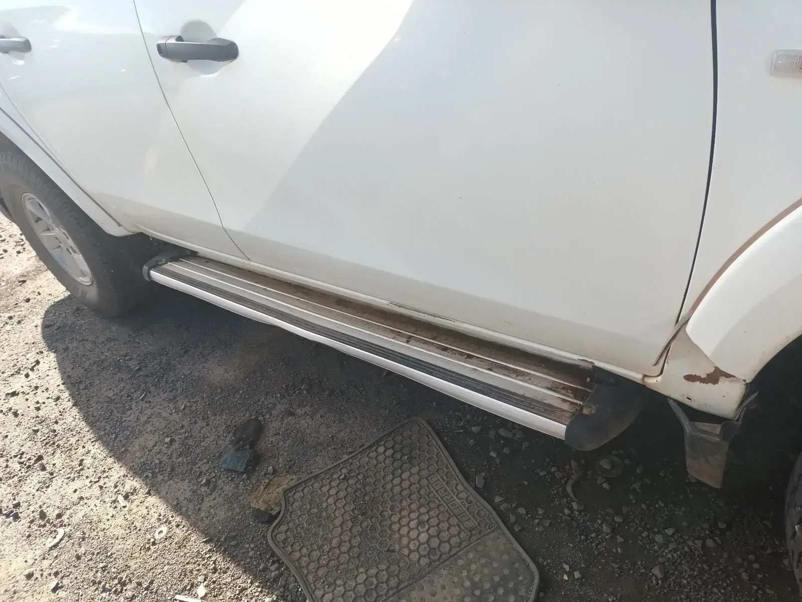 White Pickup Truck With a Silver Running Board — South West 4WD Wreckers In Brisbane, QLD