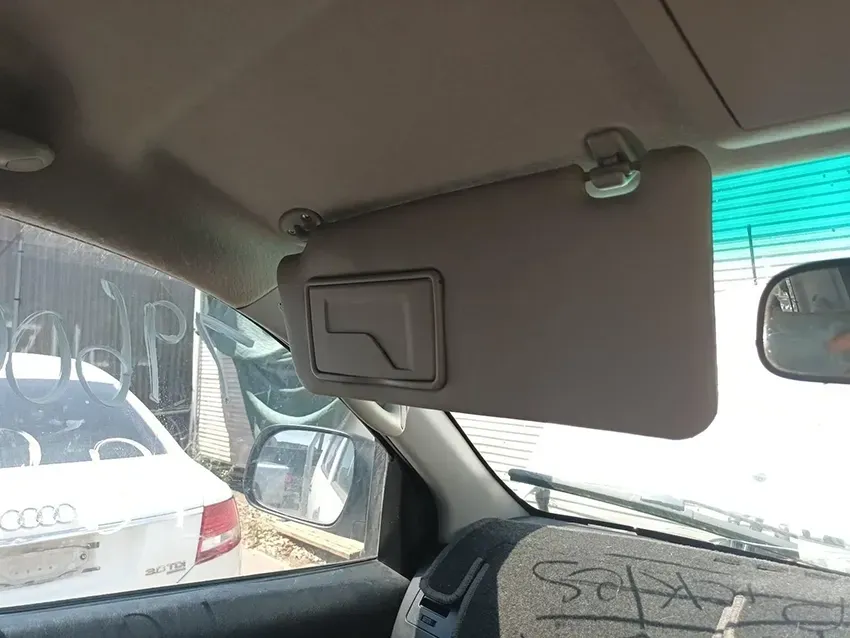 A Sun Visor is Hanging From the Ceiling of a Car — South West 4WD Wreckers In Brisbane, QLD