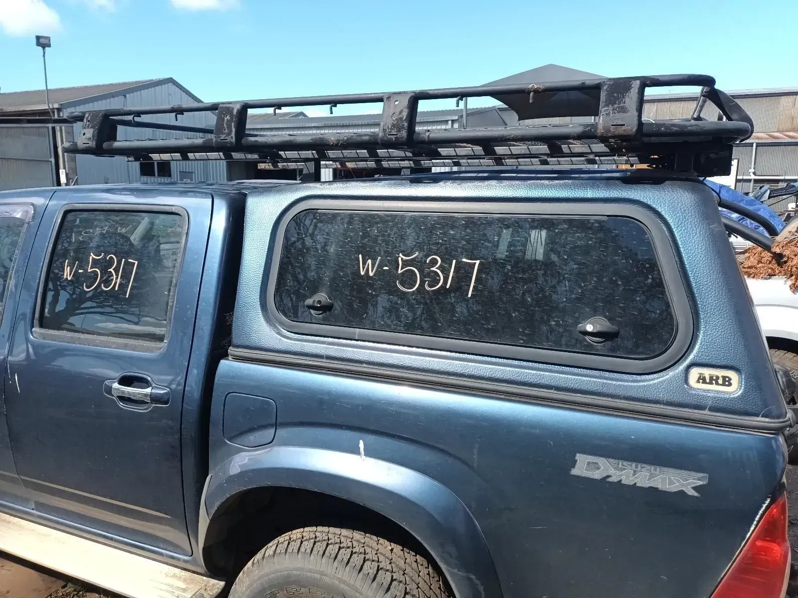 Blue Pickup Truck With a Black Rack on Top — South West 4WD Wreckers In Brisbane, QLD