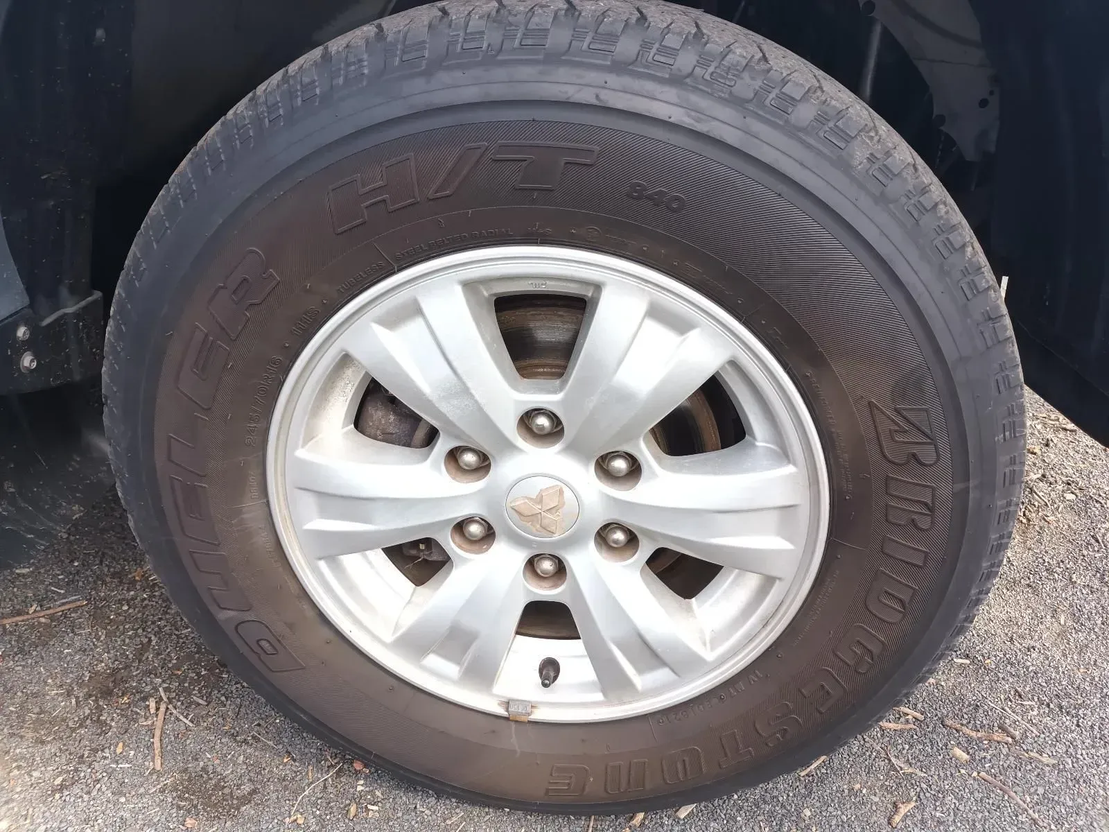 Car Tyre With a Silver Rim — South West 4WD Wreckers In Brisbane, QLD