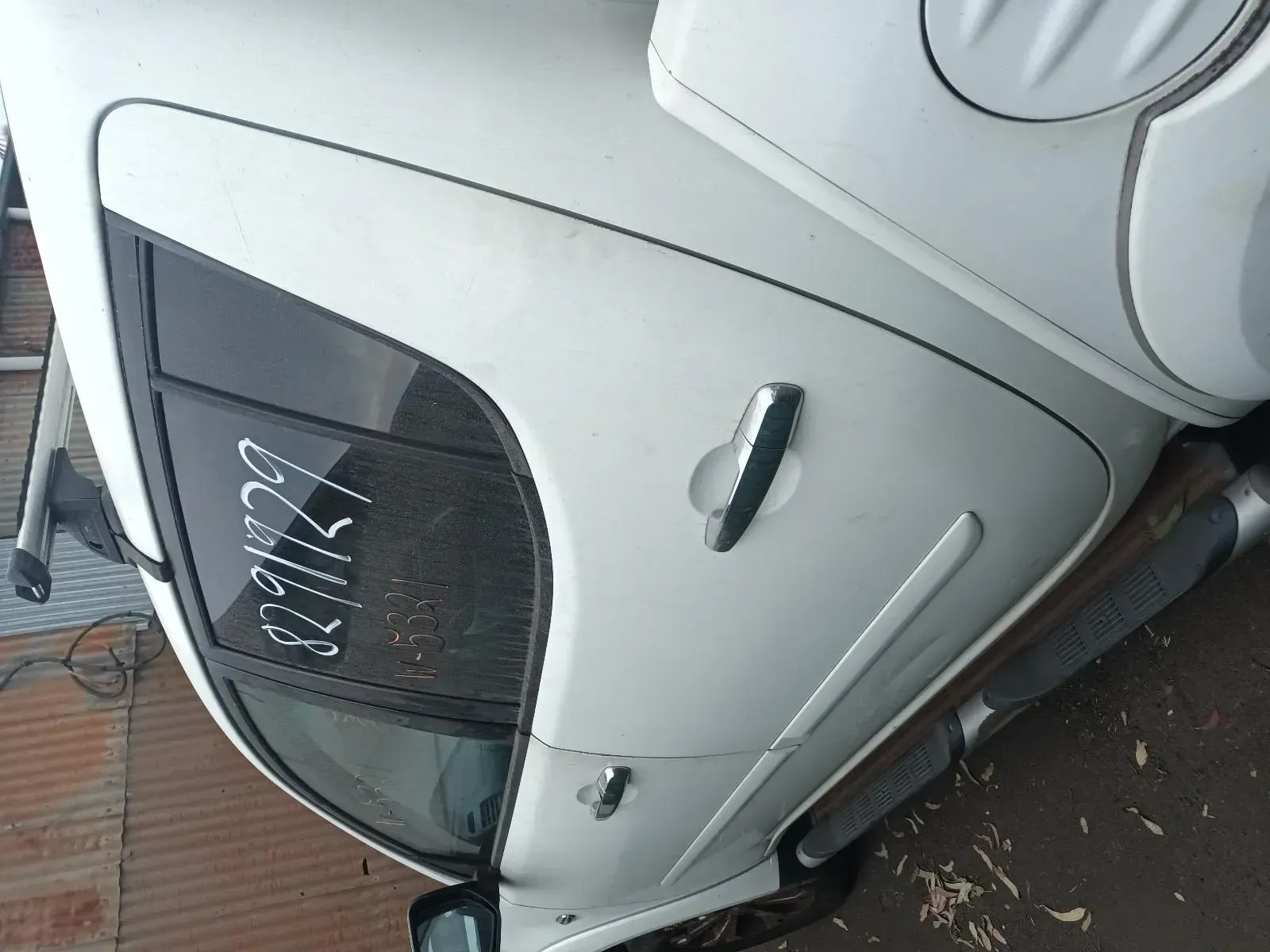 White Car Door With a Dark-tinted Window, a Chrome Door Handle — South West 4WD Wreckers In Brisbane, QLD