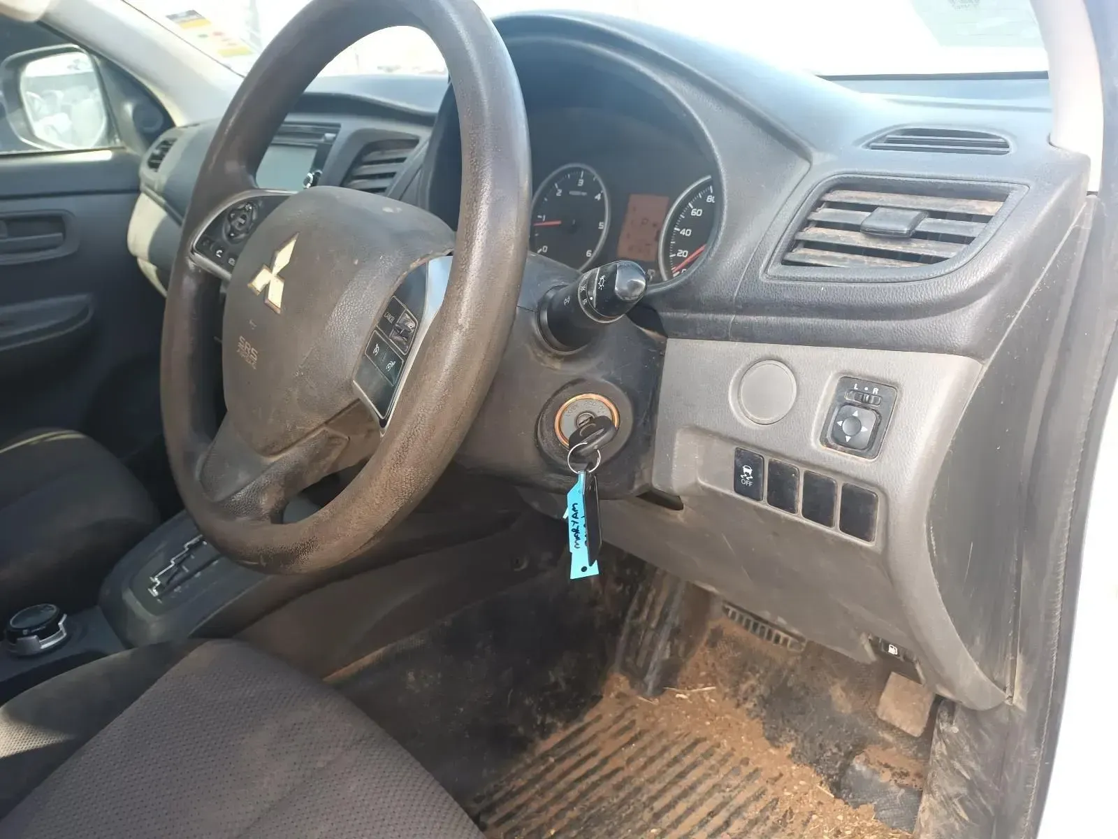 Interior View of a Mitsubishi Car, Featuring a Steering Wheel — South West 4WD Wreckers In Brisbane, QLD