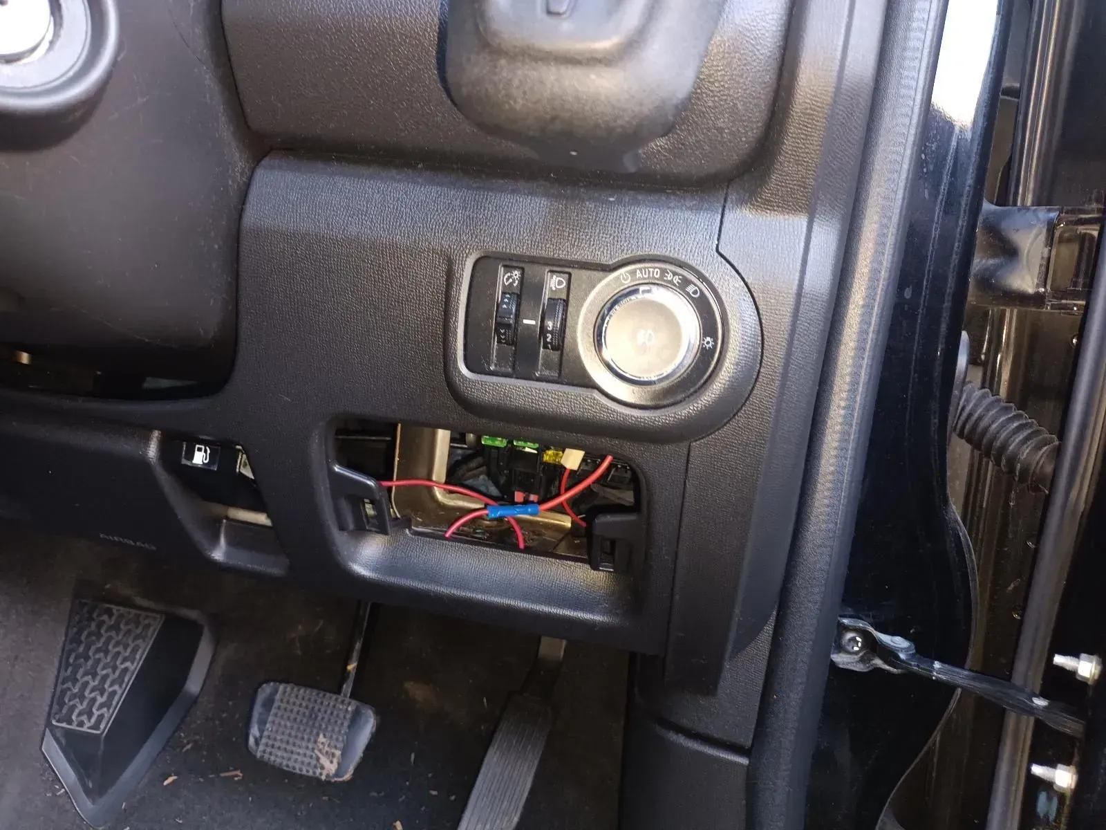 Dashboard Interior With Exposed Wiring, Ignition, and Pedal in a Black Car — South West 4WD Wreckers In Brisbane, QLD