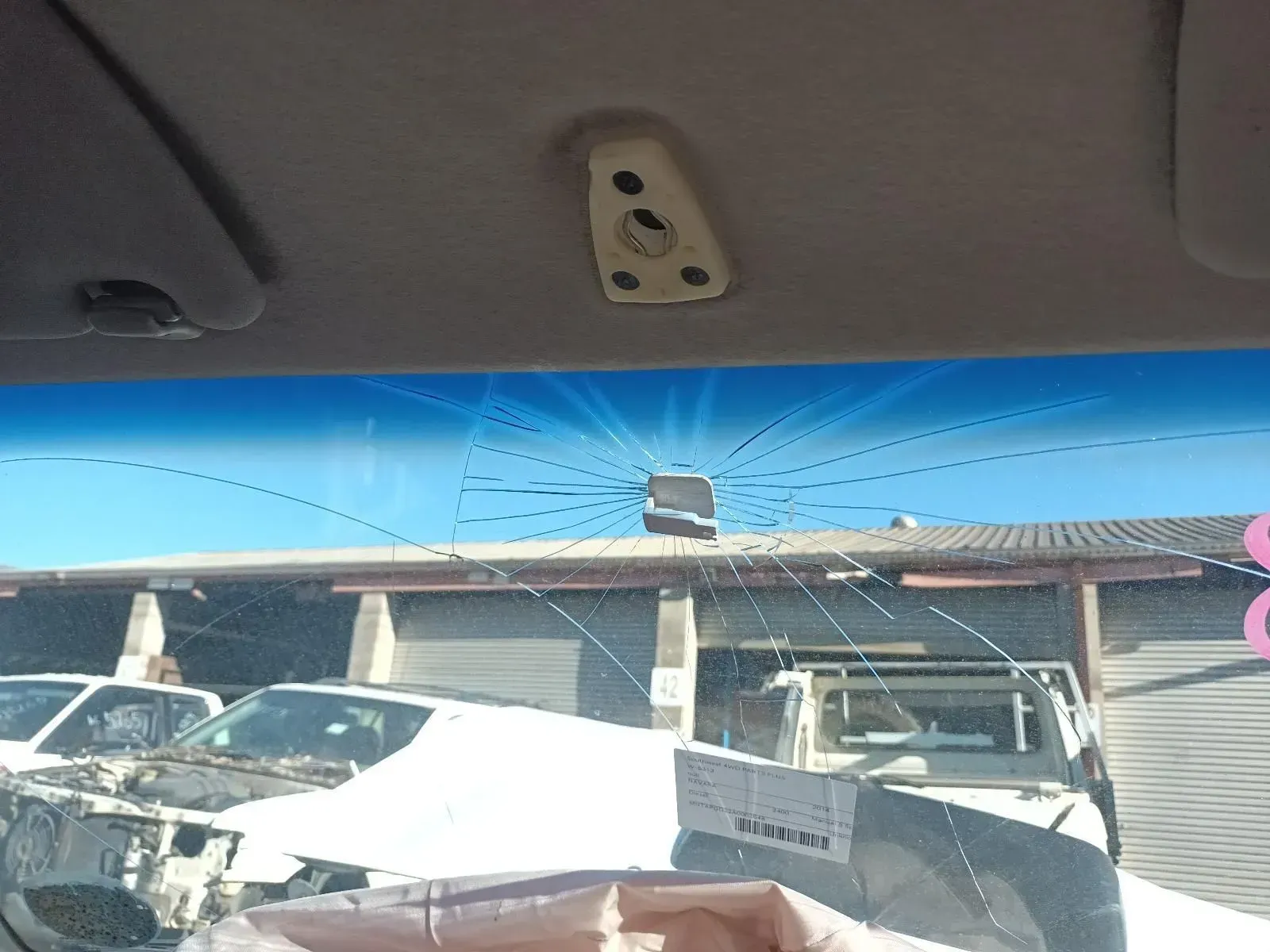 A Cracked Windshield With a Car Interior View — South West 4WD Wreckers In Brisbane, QLD