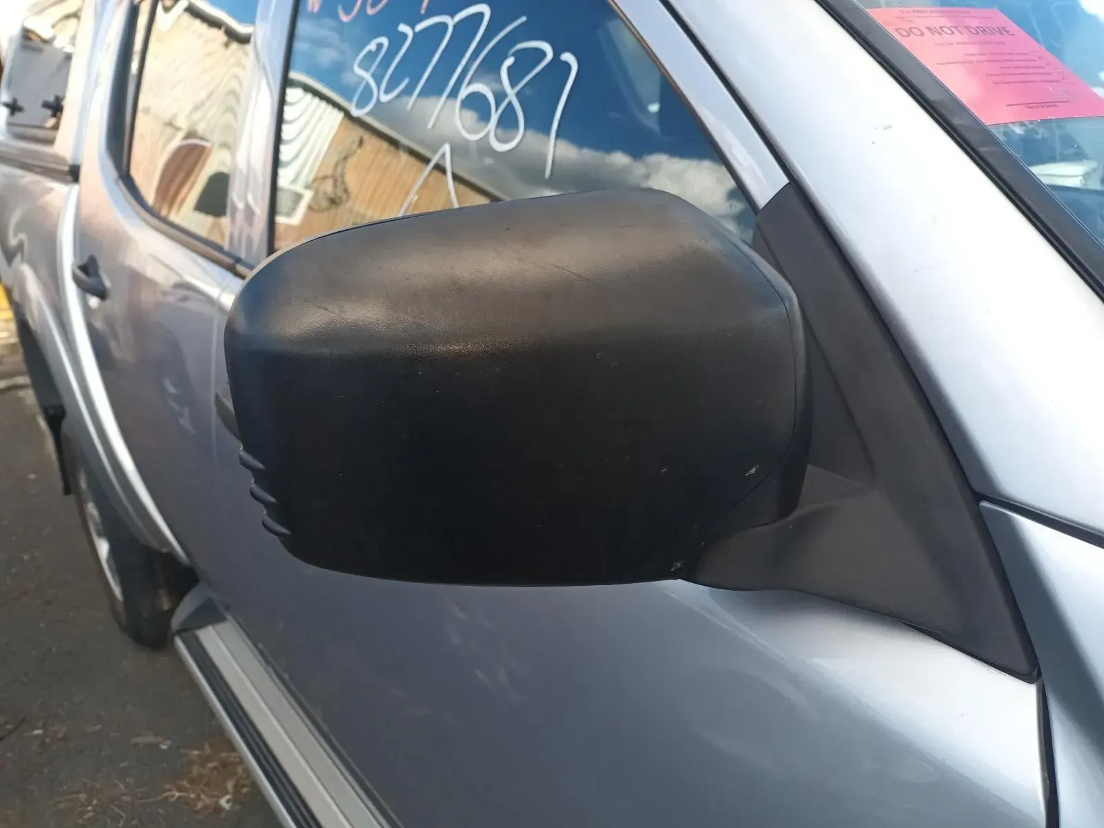 Black Side Mirror on a Silver Pickup Truck — South West 4WD Wreckers In Brisbane, QLD
