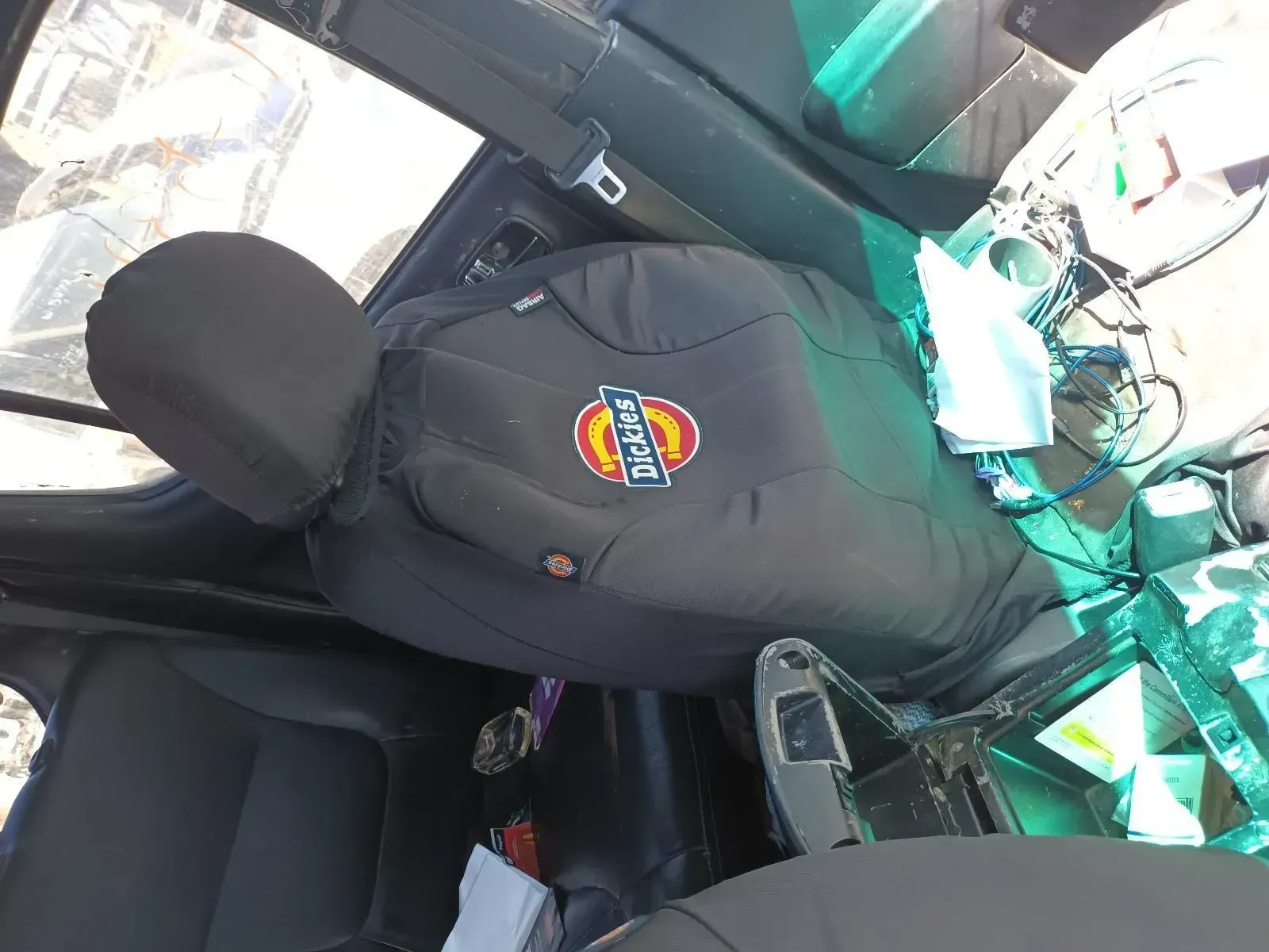 Black Car Seat With a Logo, Partially Visible Car Interior — South West 4WD Wreckers In Brisbane, QLD