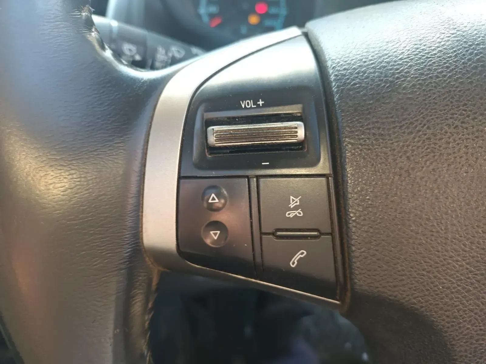 Close-up of a Car's Steering Wheel With Volume and Call Buttons — South West 4WD Wreckers In Brisbane, QLD